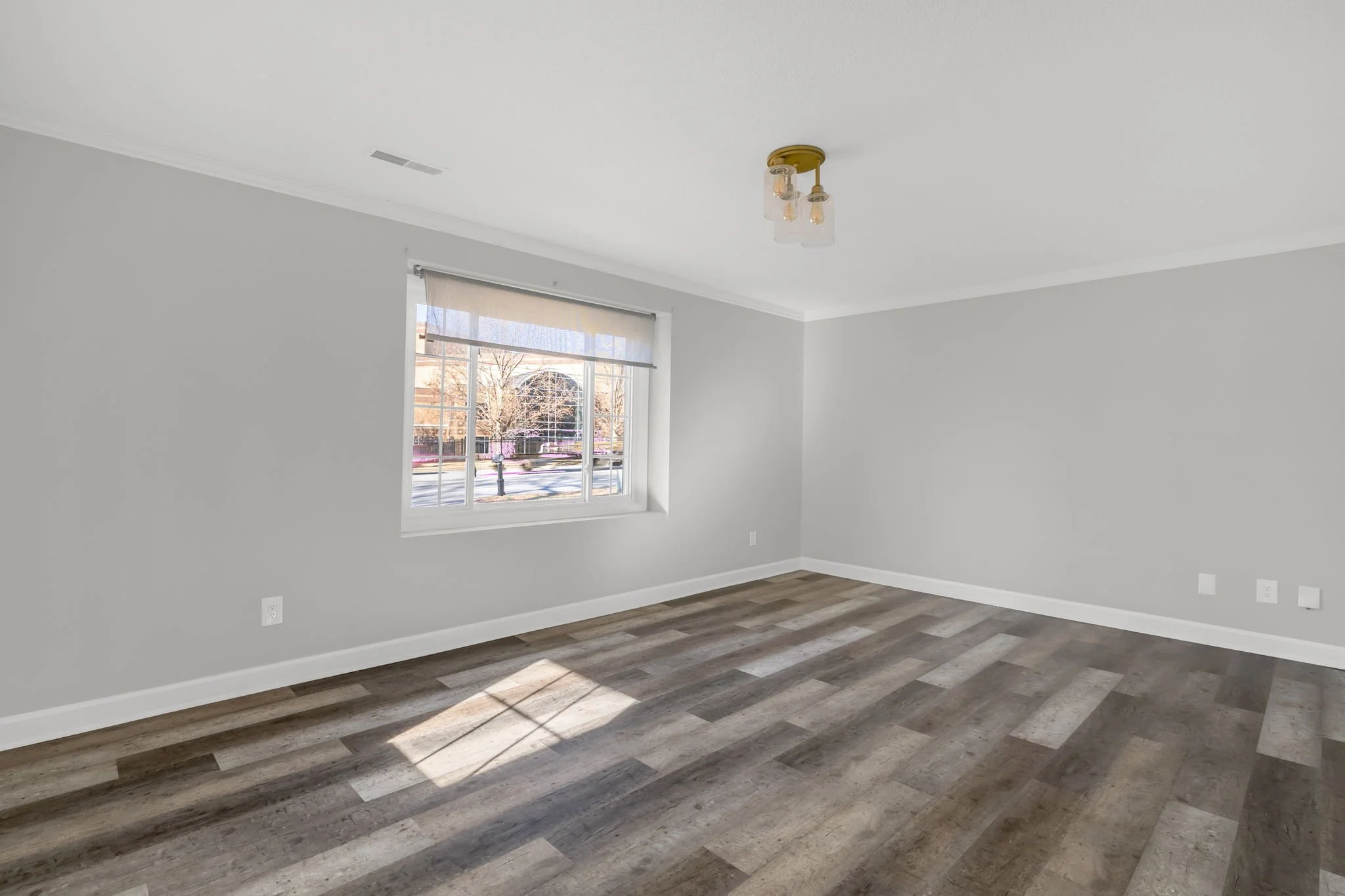 Bright living room with large windows and natural light at 5218 Lawndale Dr