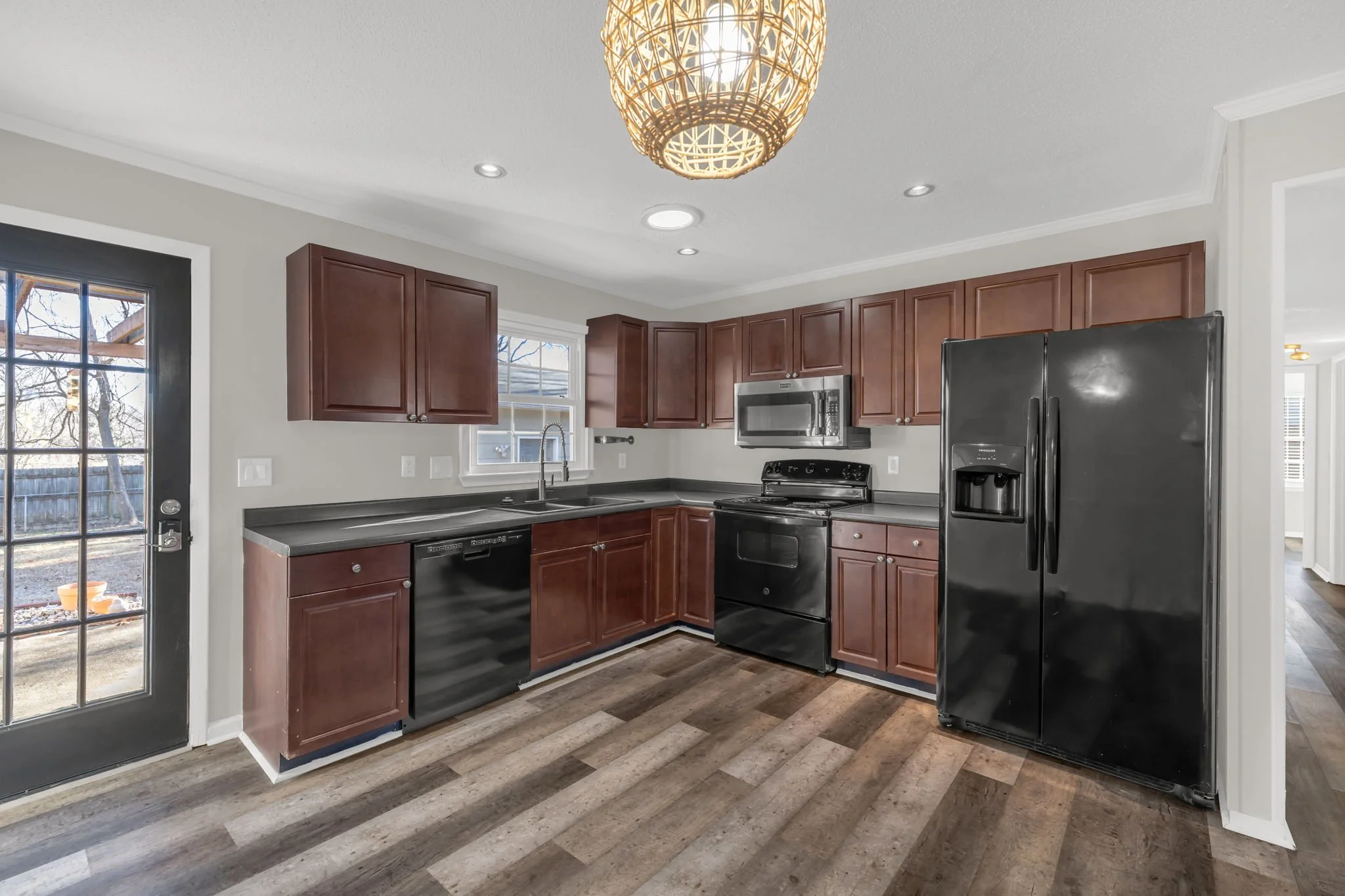Additional kitchen angle highlighting counter space and cabinetry