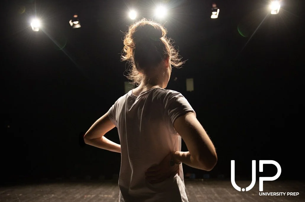 College Audition student performing under stage lights