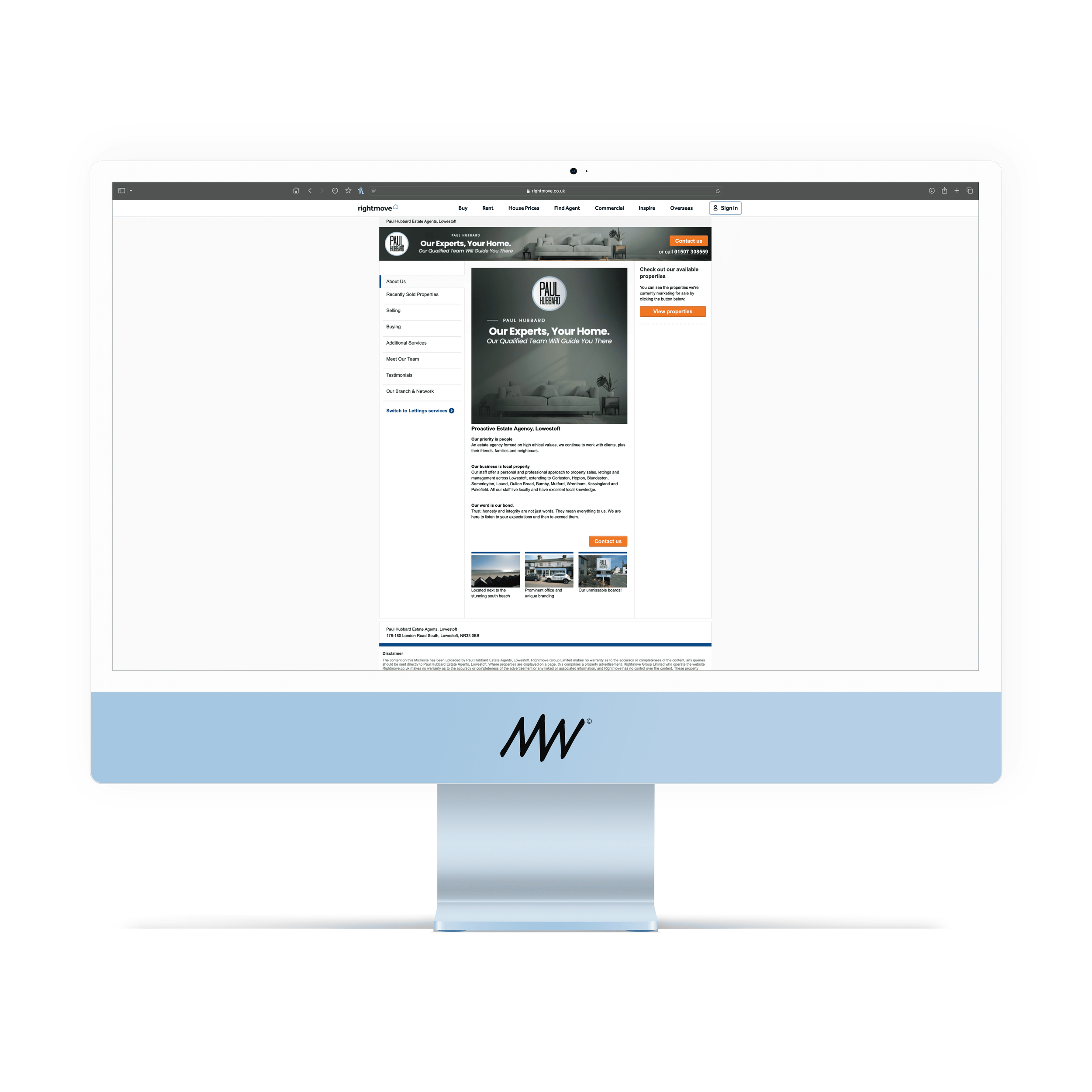 Computer screen displaying a real estate website with property listings and contact information.