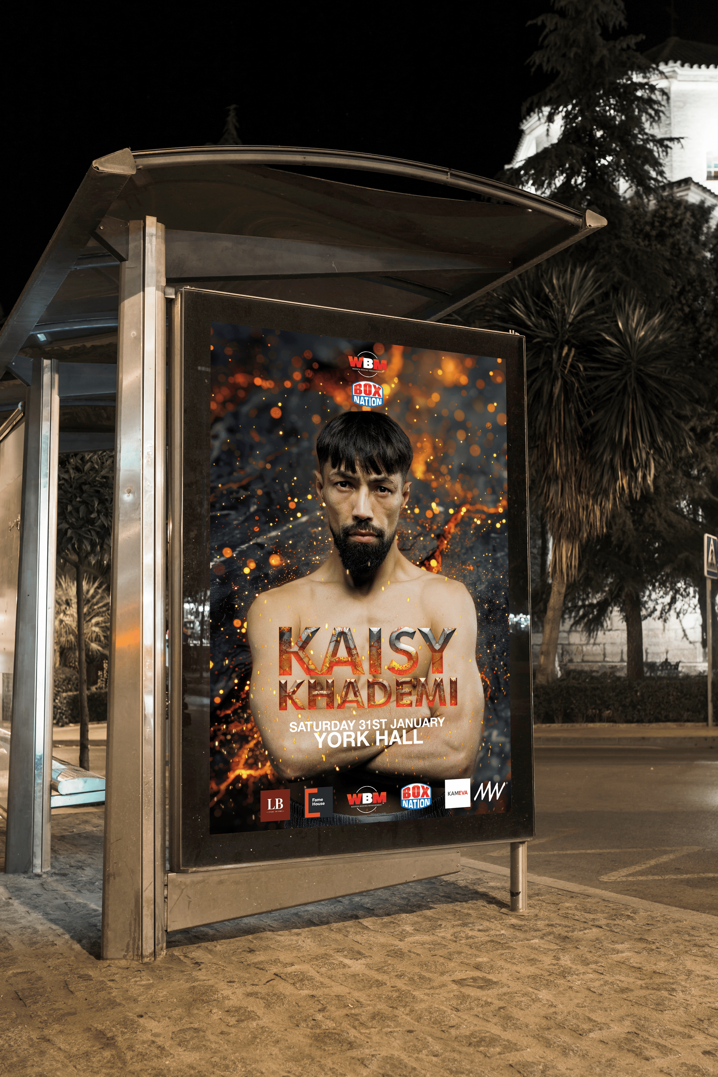 A poster advertising a boxing event with a shirtless male boxer with crossed arms, dark hair, and a beard, against a fiery background. The event is on Saturday, January 31st, at York Hall, featuring Kaisy Khademi.