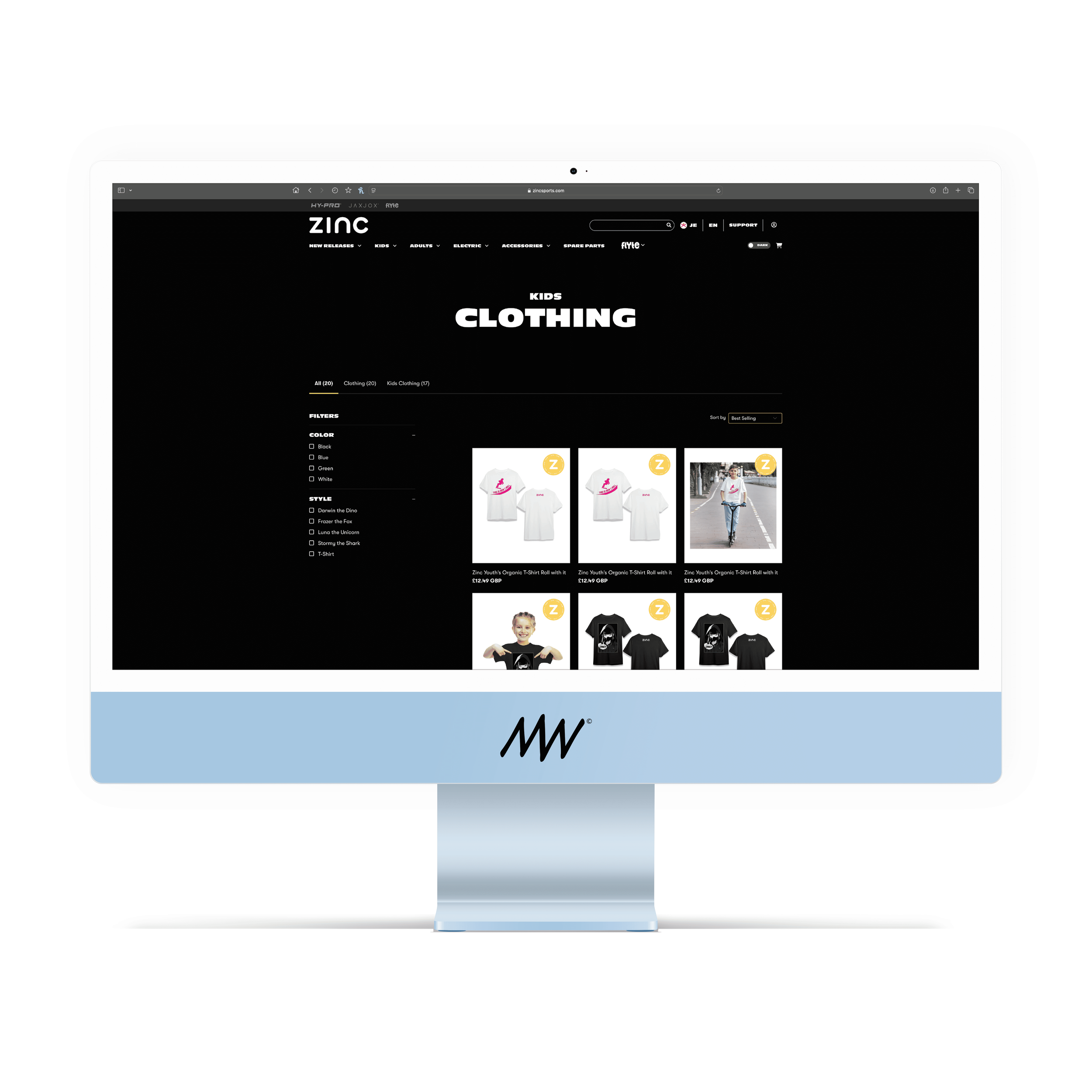 Computer monitor displaying an online store's kids clothing section with various t-shirts and apparel on a black background and a blue logo at the bottom.