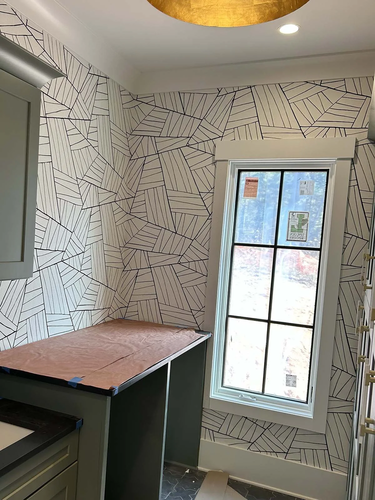 Geometric wallpaper installation