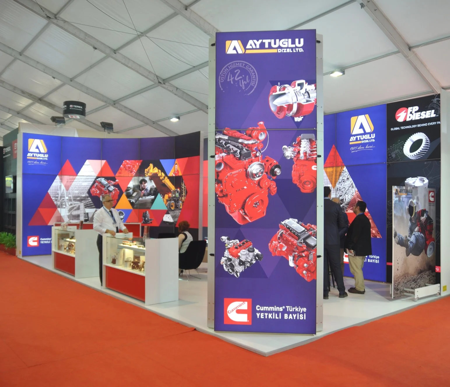 Print, wide-angle booth photo from the event.