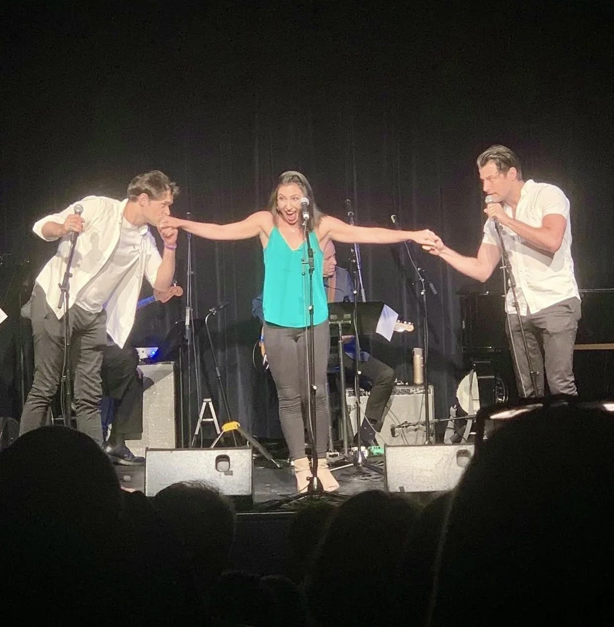 Sydney Bossuk performing with Michael Campayno and Chris Peluso at TFCA 