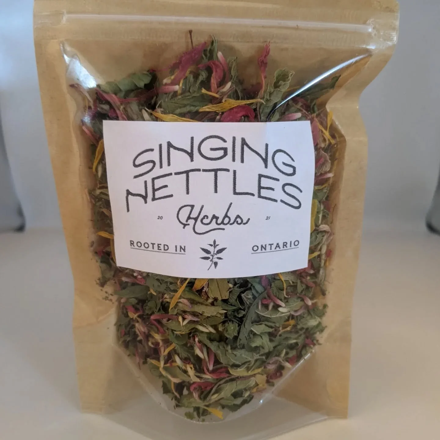 Guess what? I have new tea blends, as well as single herbs, available for sale this holiday season!

 Pictured here are three blends. The first one pictured  is called Tea Party, featuring calendula and bee balm flowers. 

The second tea featured is 