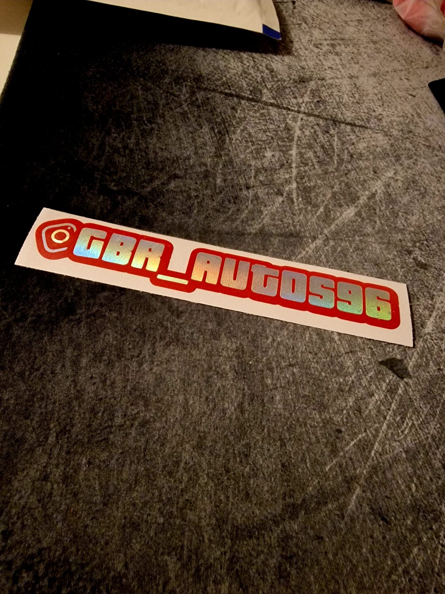 Holographic With Red Background.jpeg
