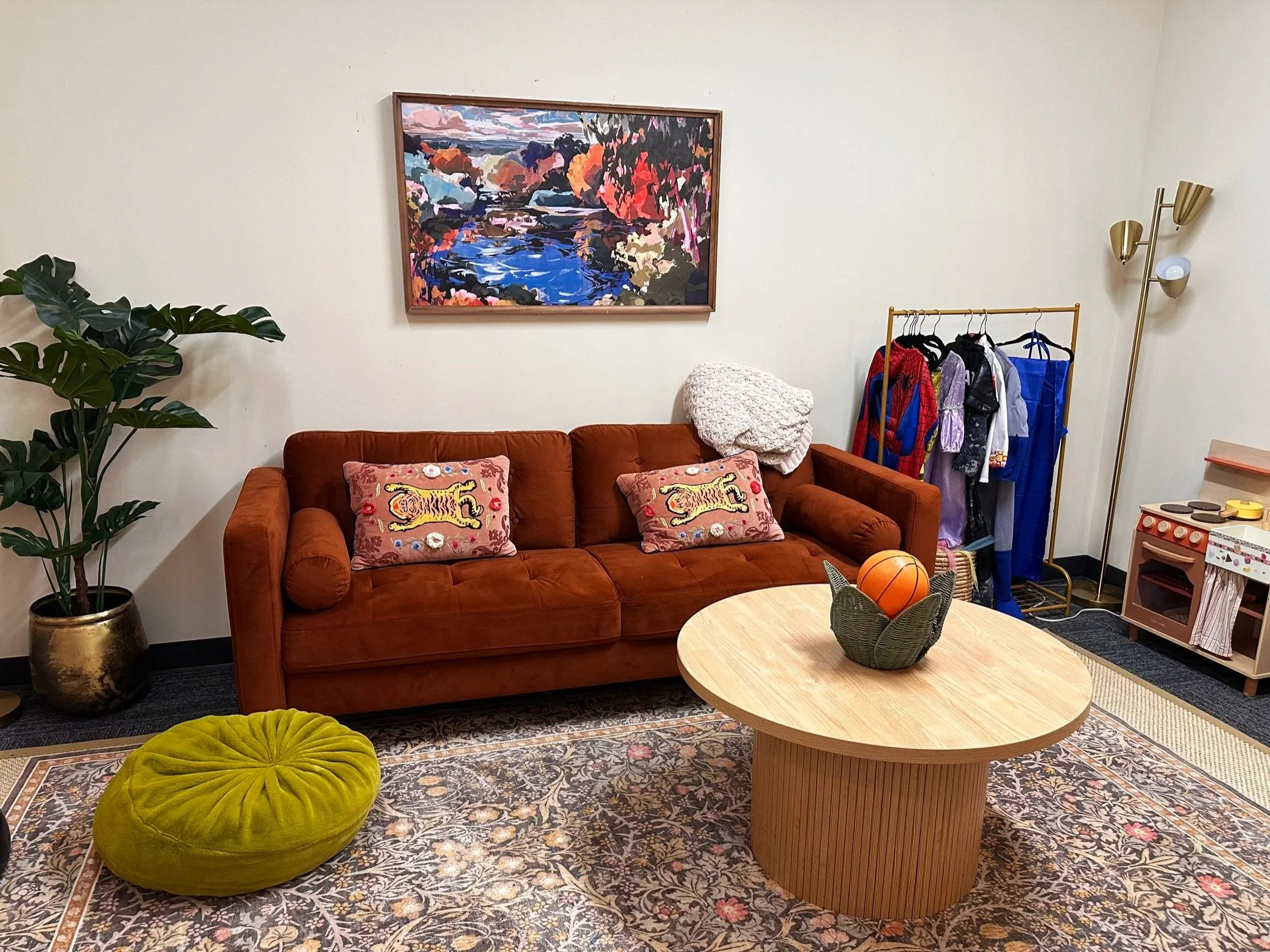 From costumes to cozy corners, our play therapy room holds space for imagination, big feelings, and everything in between. Children can be exactly who they need to be in here.