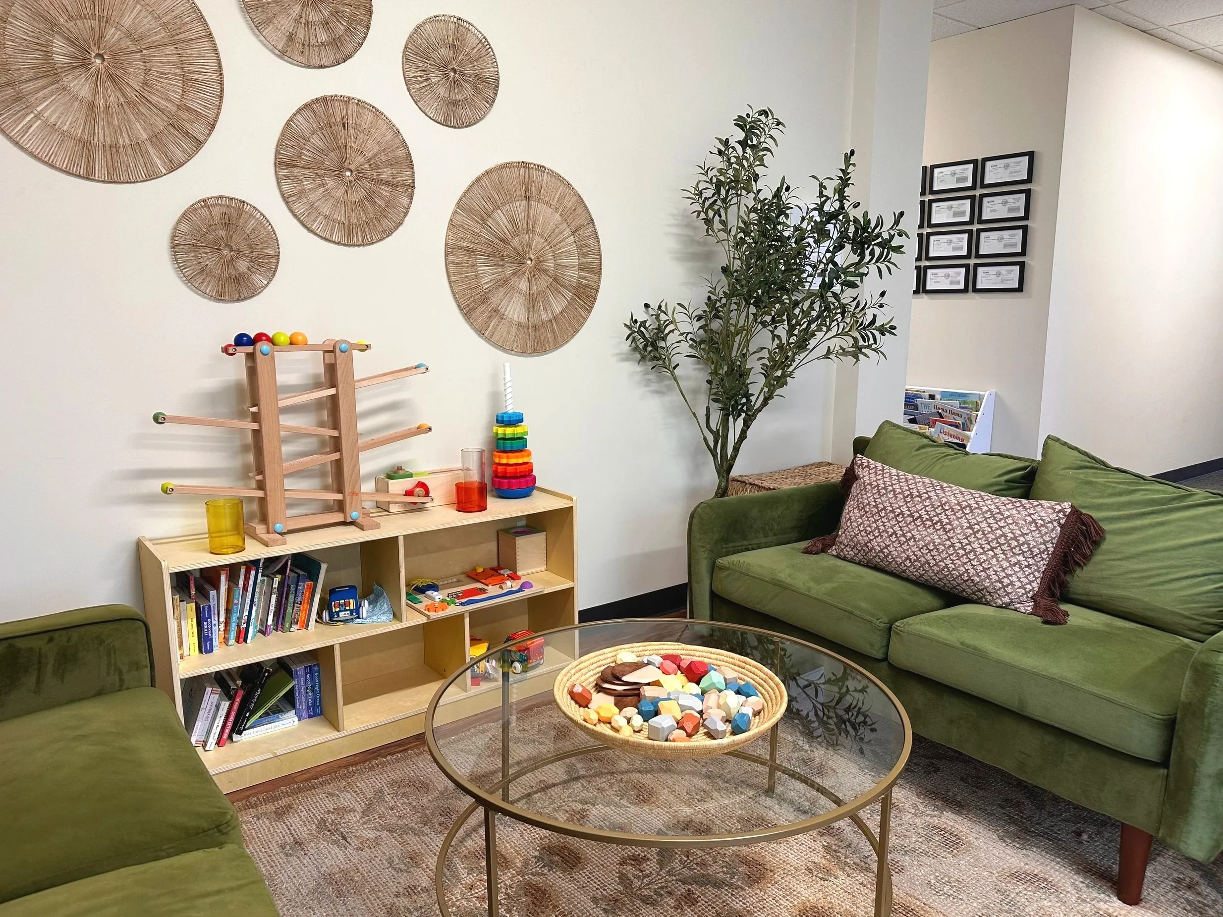 Waiting does not have to mean just waiting. Our reading and activities corner keeps children engaged and gives siblings something meaningful to do while their brother or sister is in session.