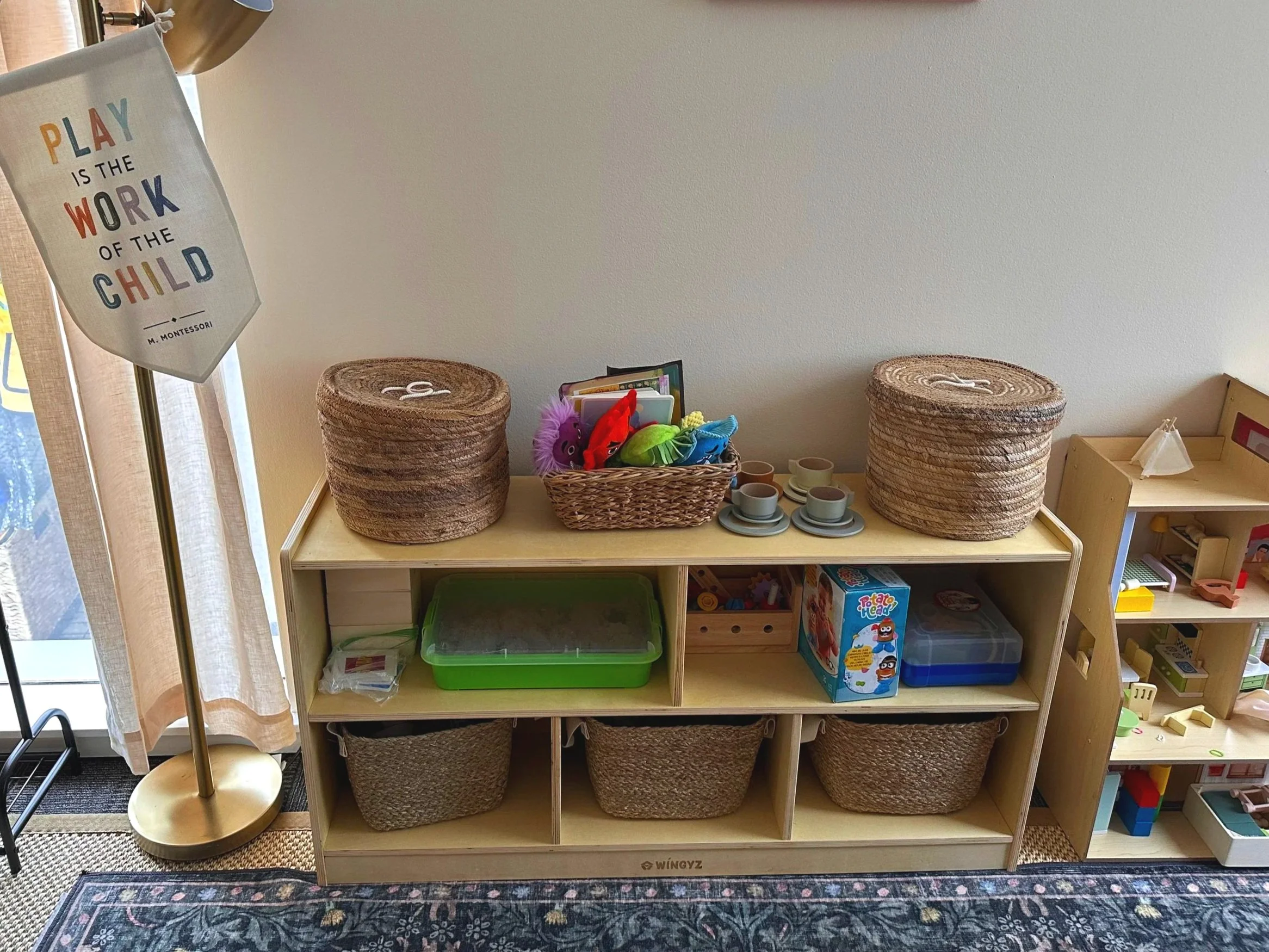 Play is the work of the child. Maria Montessori. We take that seriously. Every basket, toy, and material in this room was chosen to meet children where they are.
