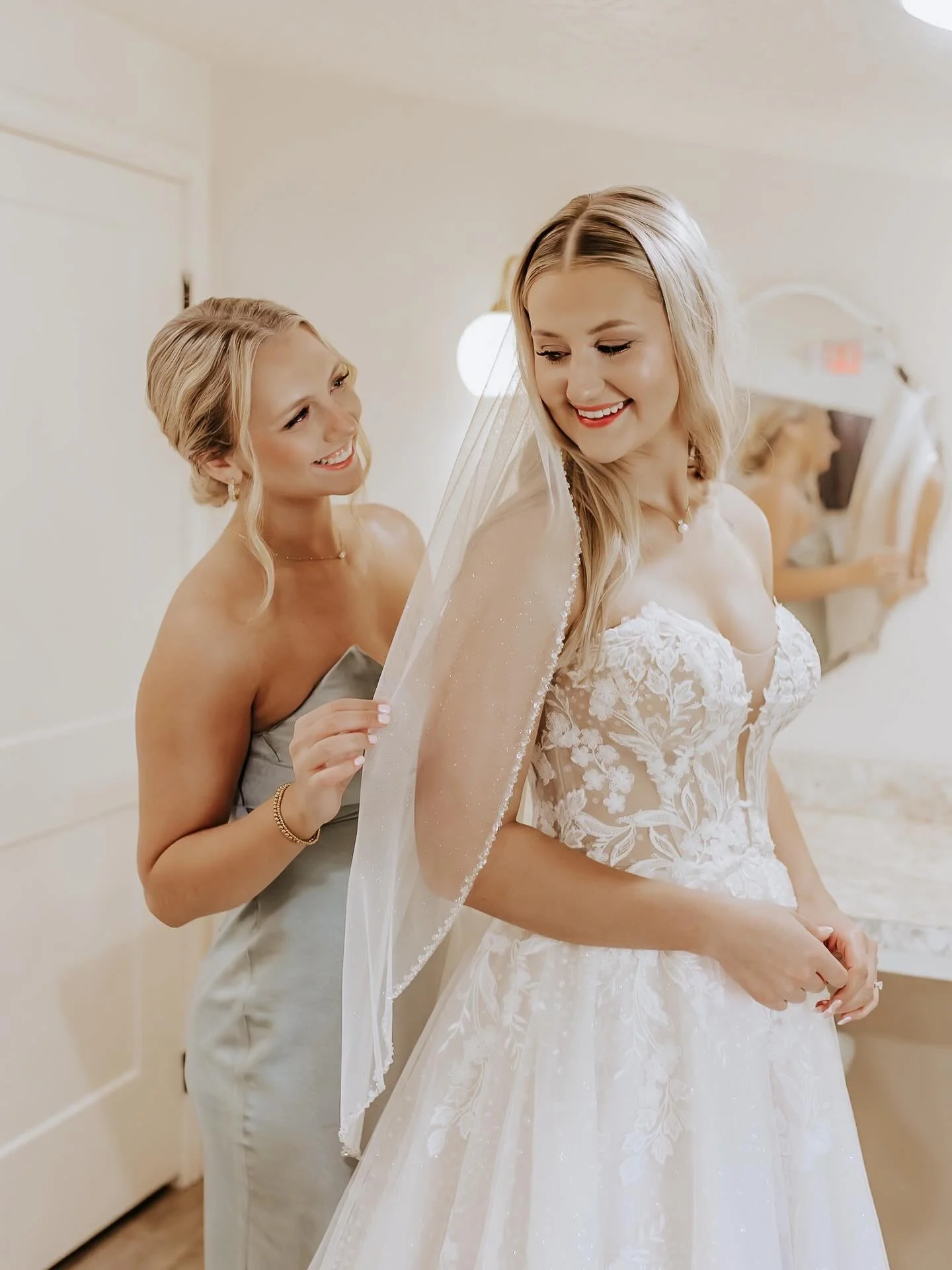 Kamber asked her maid of honor to help her get into her dress, then she did a first look with all of her family. I loved capturing the special moment between two besties and then the reaction of her family when they all saw her in her dress for the f
