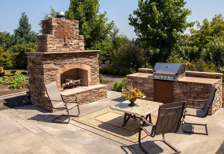 large-stone-fireplace-and-outdoor-kitchen.jpg