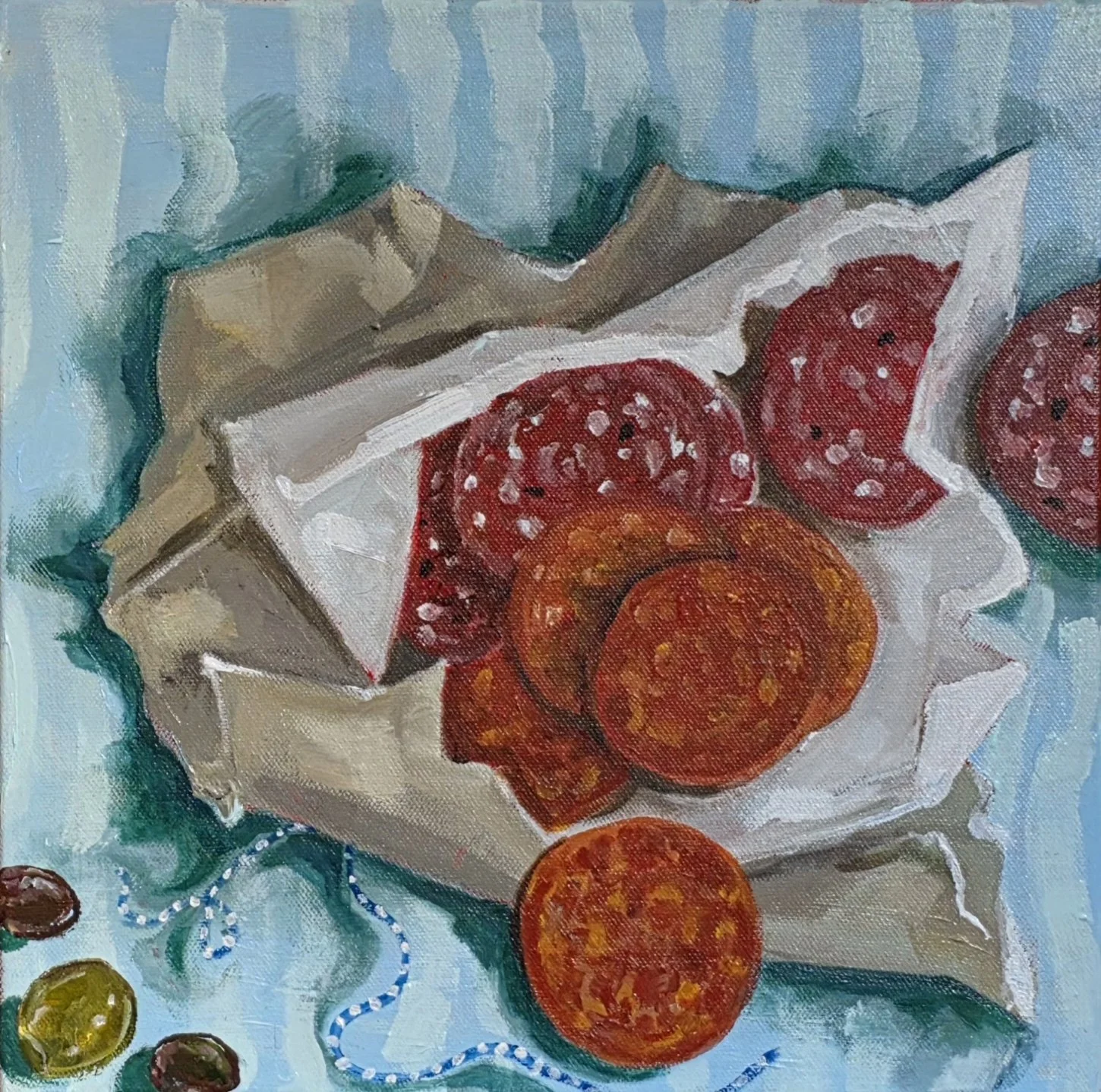 Salami with olives.
