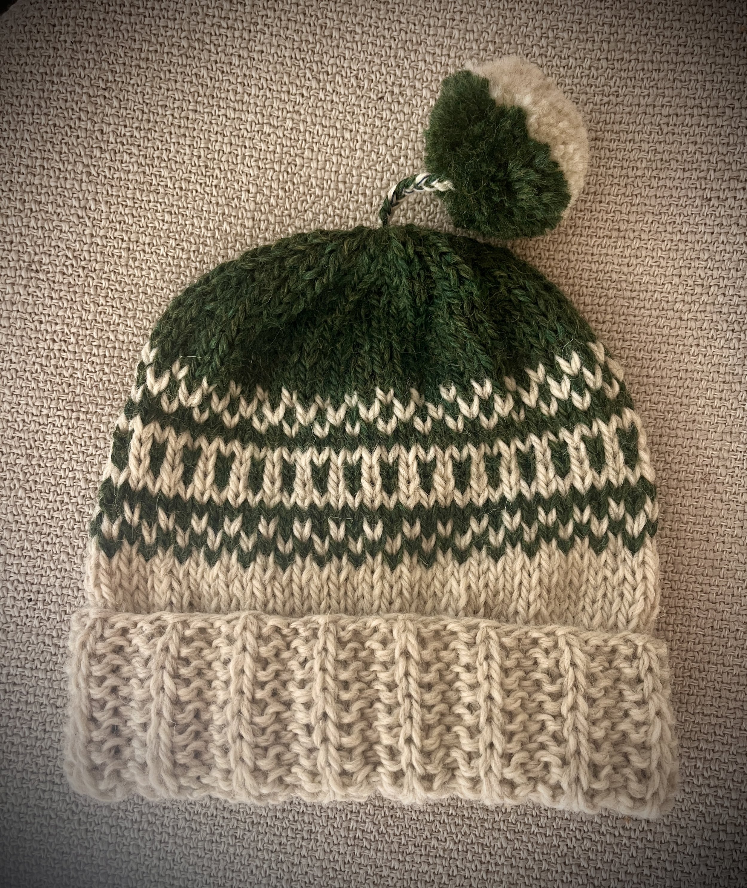 Boys hand knit nordic style beanie, green / natural, tassel with pompom, 4-8 yrs
