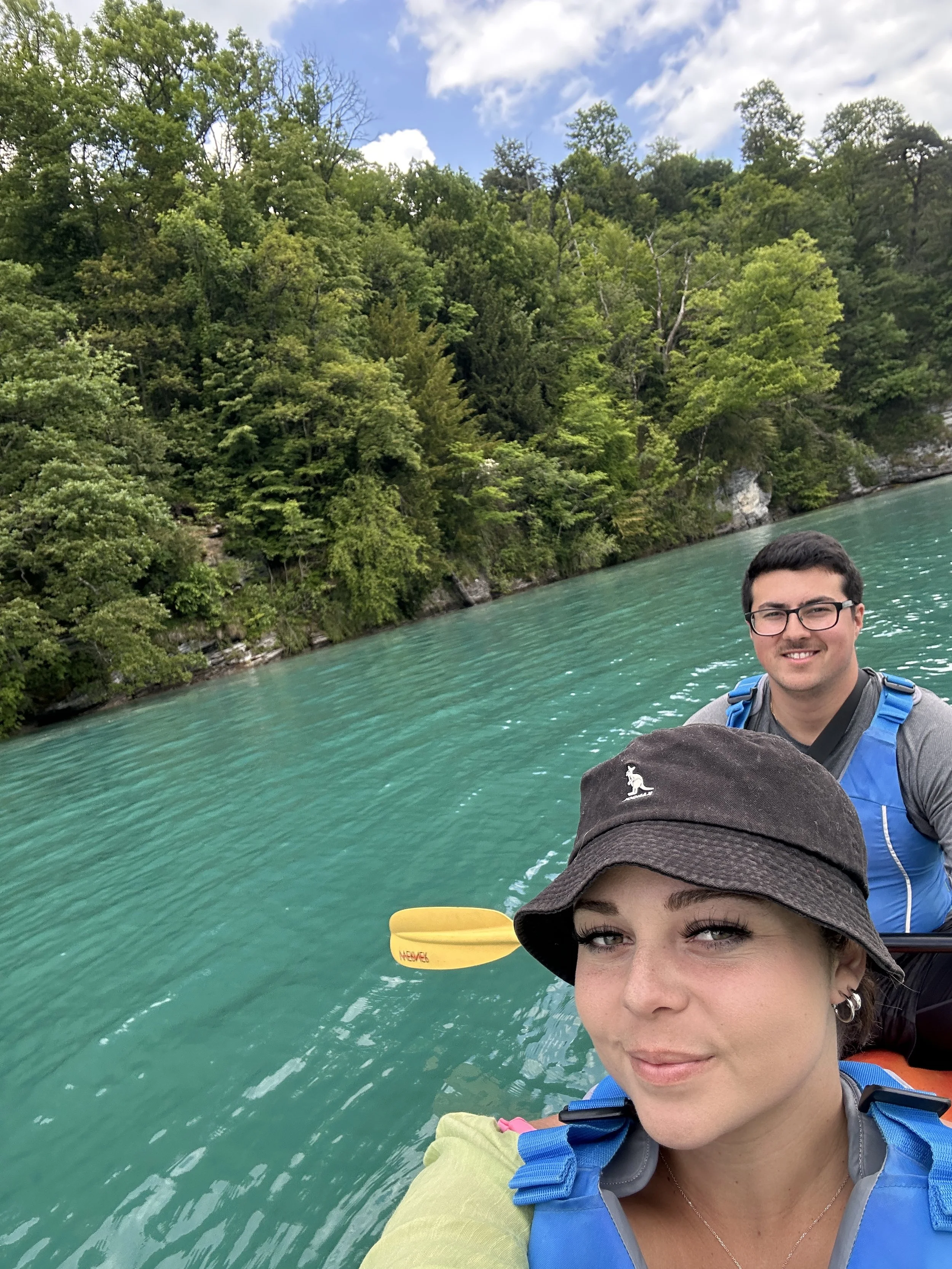 Two People Kayaking on Lake Thun