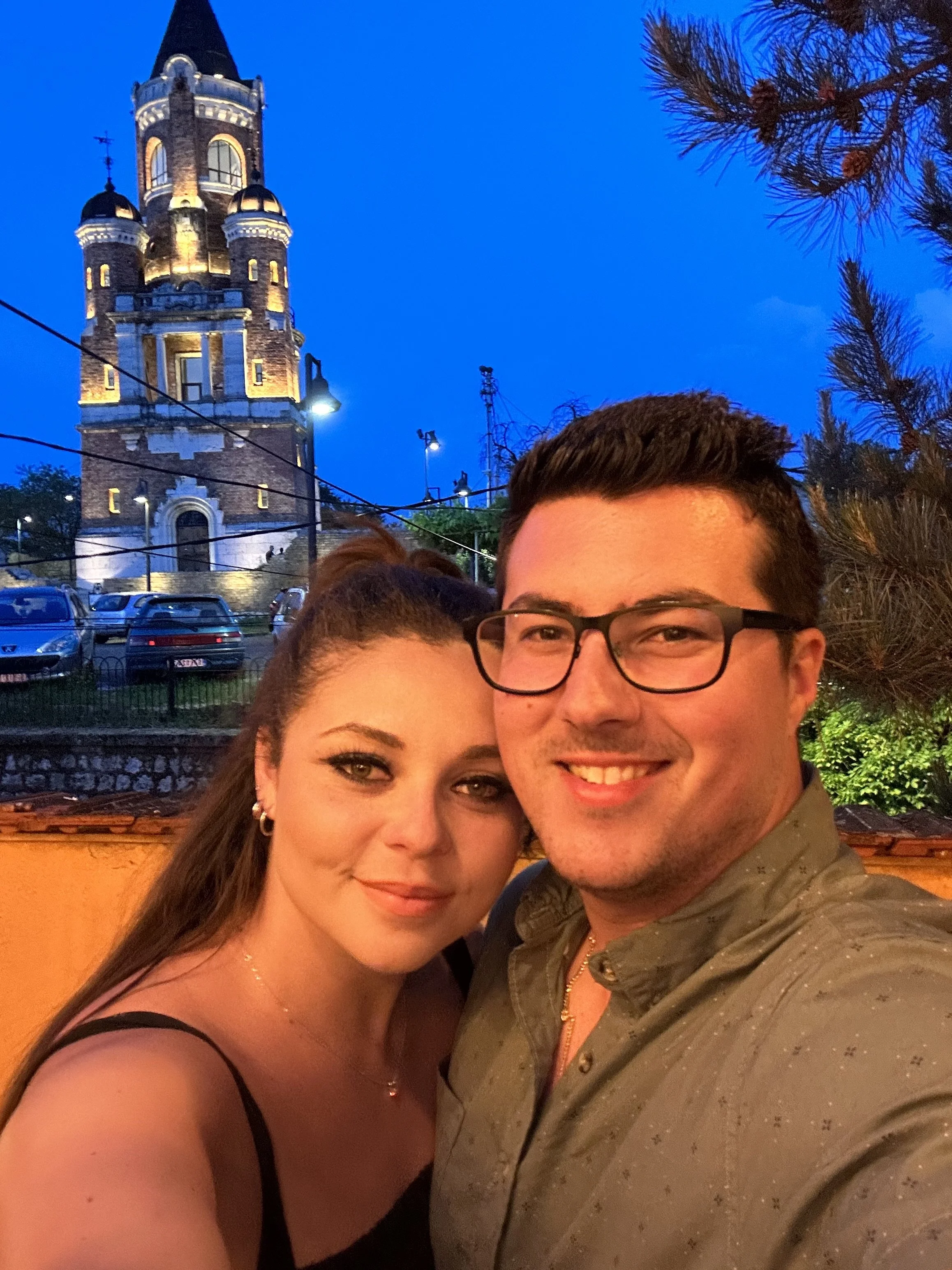 Two People with Gardos Tower in the Evening