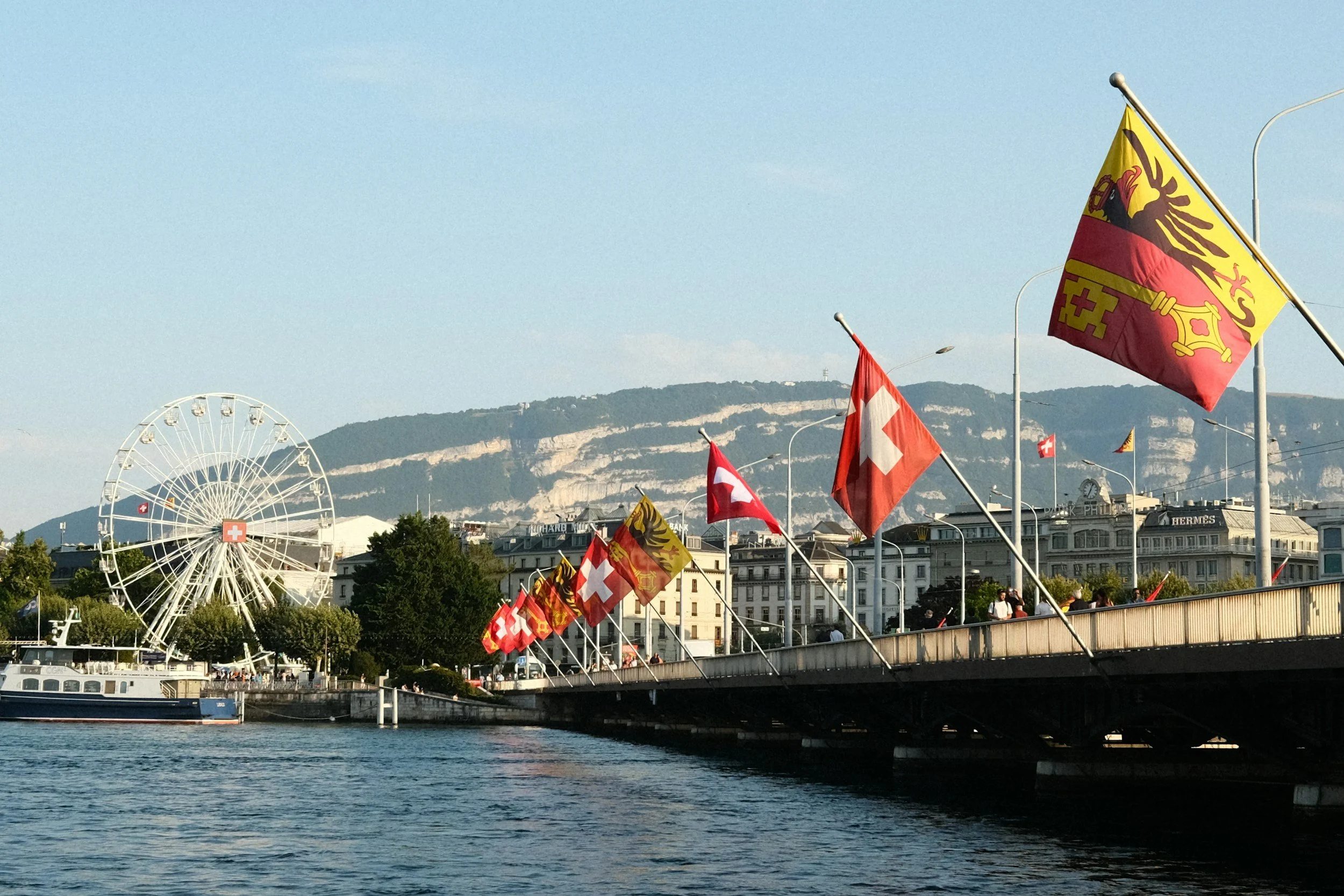 Geneva Ferris Wheel and Swiss Flags