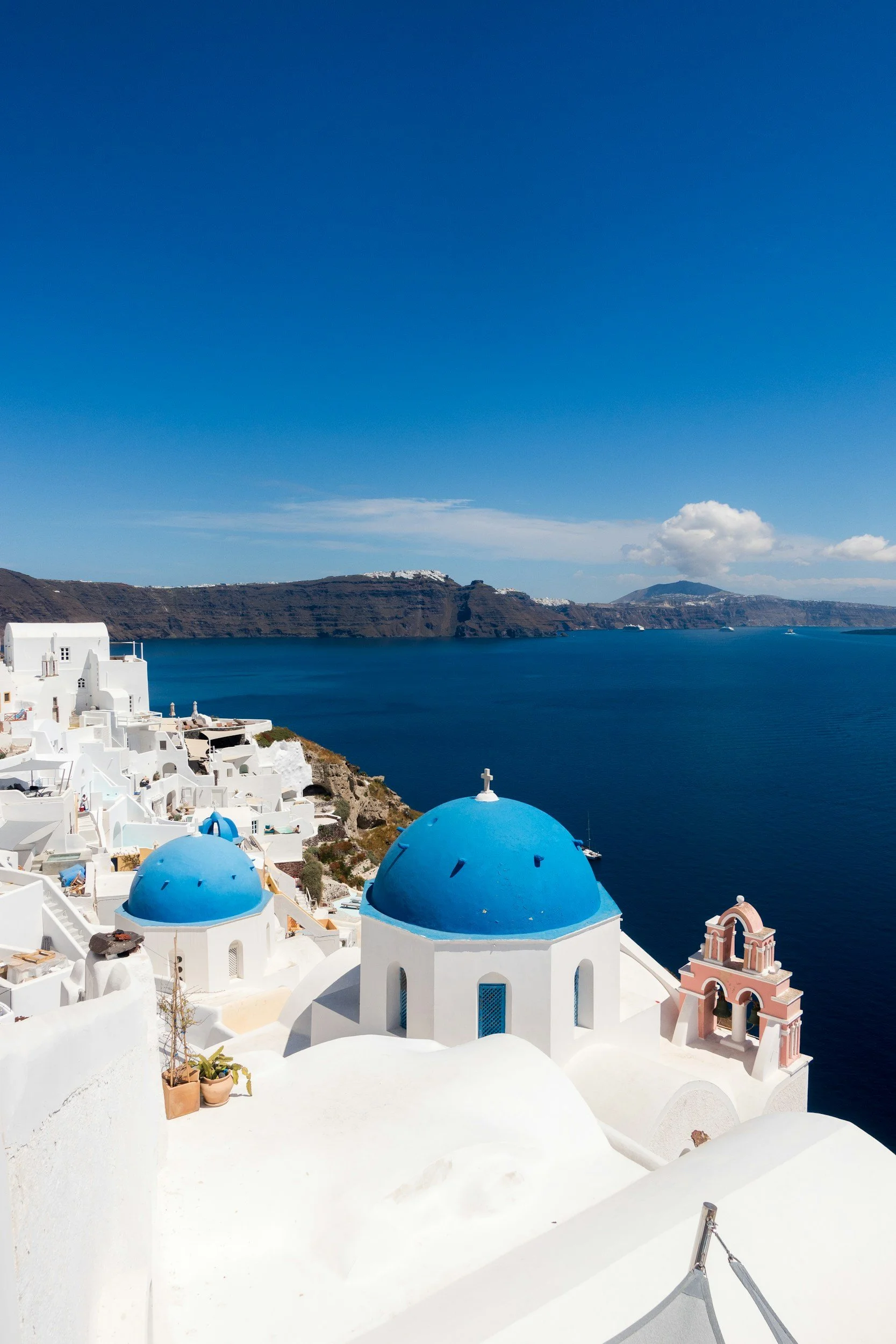 Santorini Blue Dome with Ocean in background