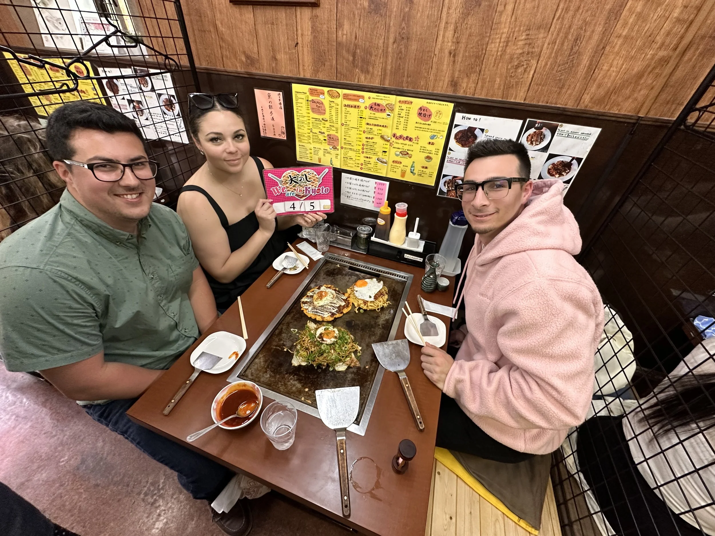 Friends Eating Japanese Pizza from Dainoji in Kyoto
