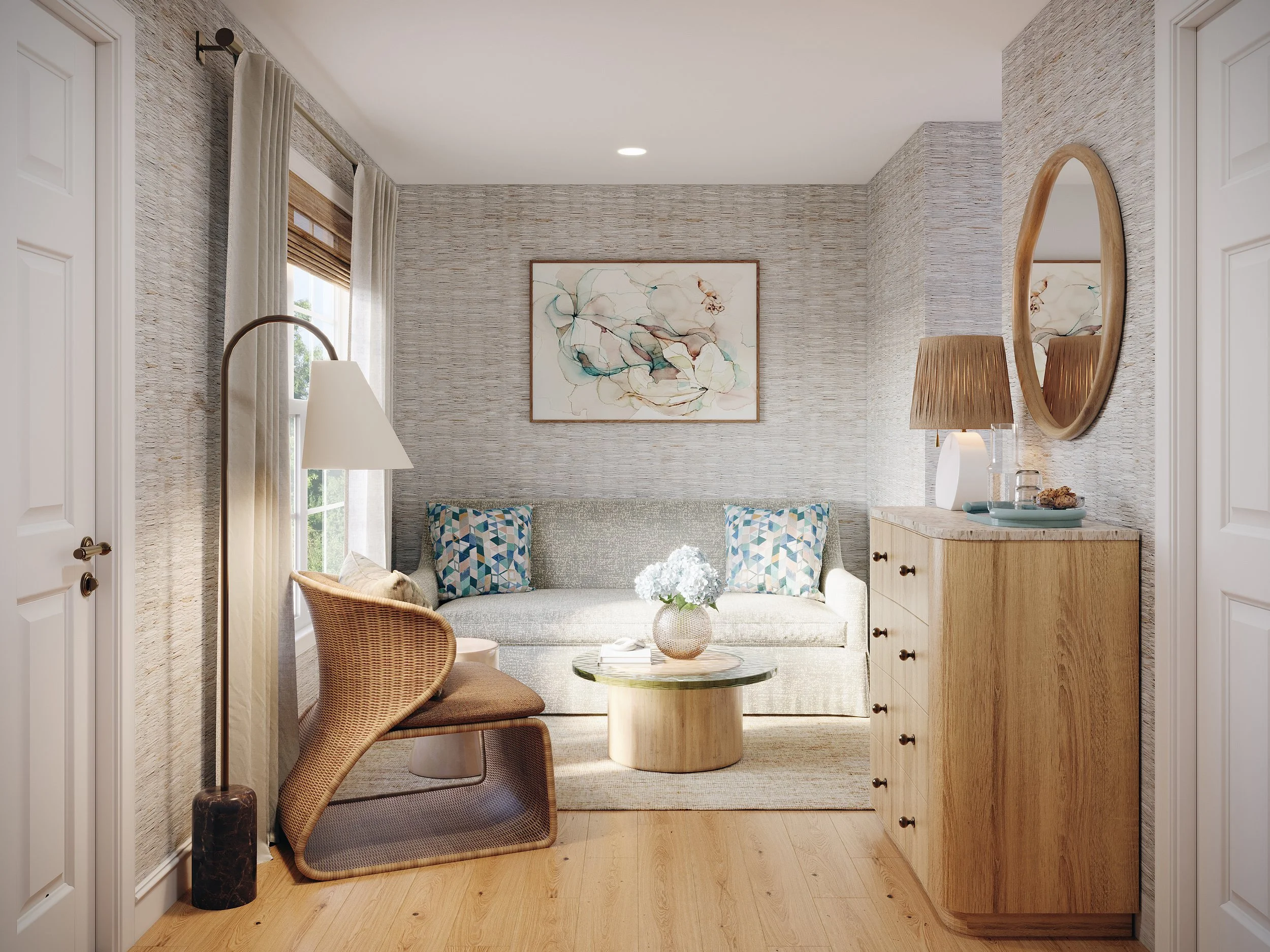Coastal-inspired hotel suite living area with custom Reider + Co furnishings, rattan chair, natural textures, floral art, and a serene palette reflecting the Cape Cod setting.
