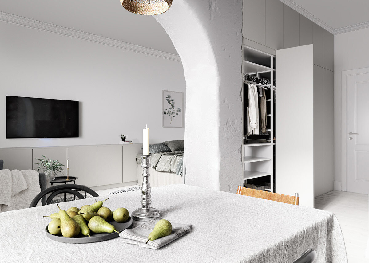 contemporary-nordic-table-setting-with-simple-fruit-bowl-and-vintage-candlestick.jpg