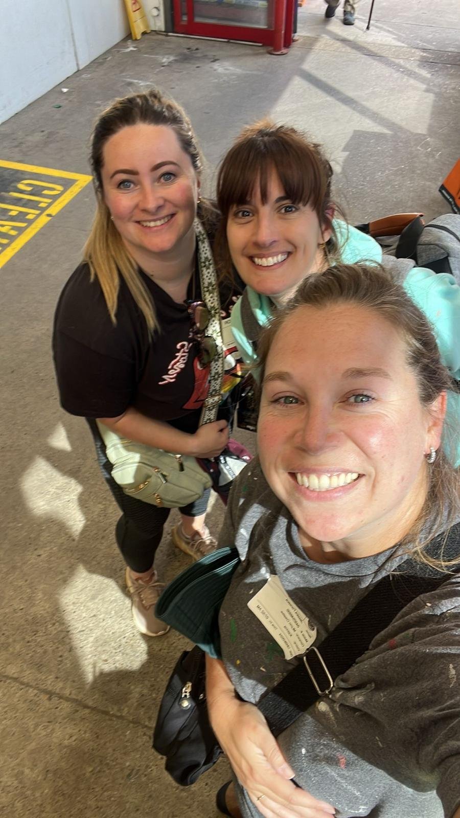 three women stood posing for a photo together on their last day at the retreat before they all part and go home