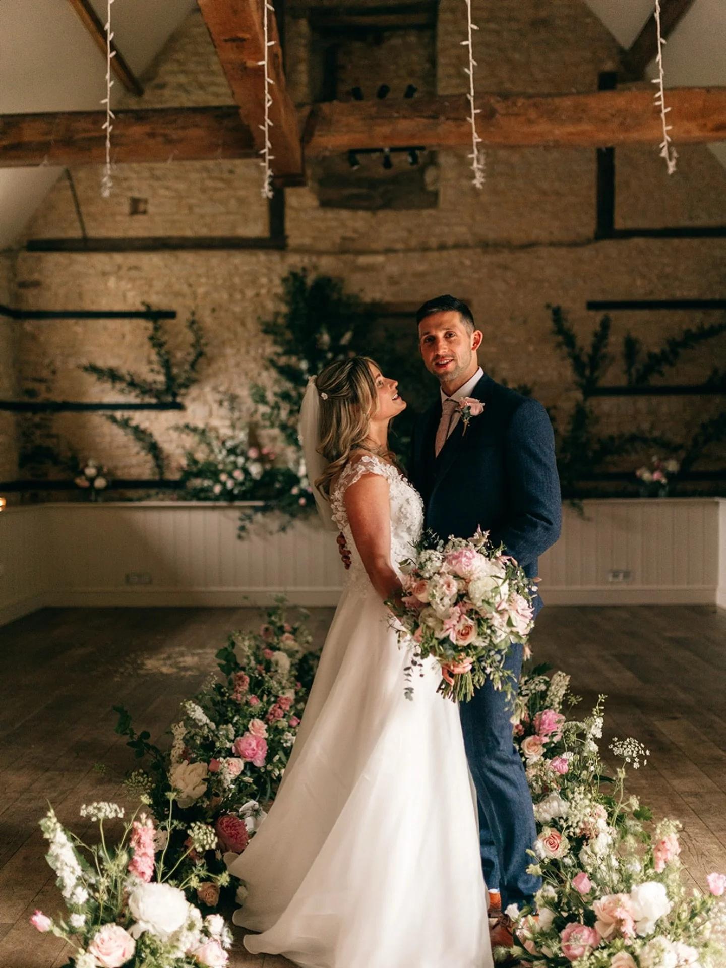 A moment that shows just how beautiful this space can be &mdash; flowers framing the aisle, soft light through the beams, and that rustic-elegant charm Wick is known for 💐 

📸 @mariamadisonphotography 

#WickFarmBath #CotswoldsWeddingVenue #BarnWed