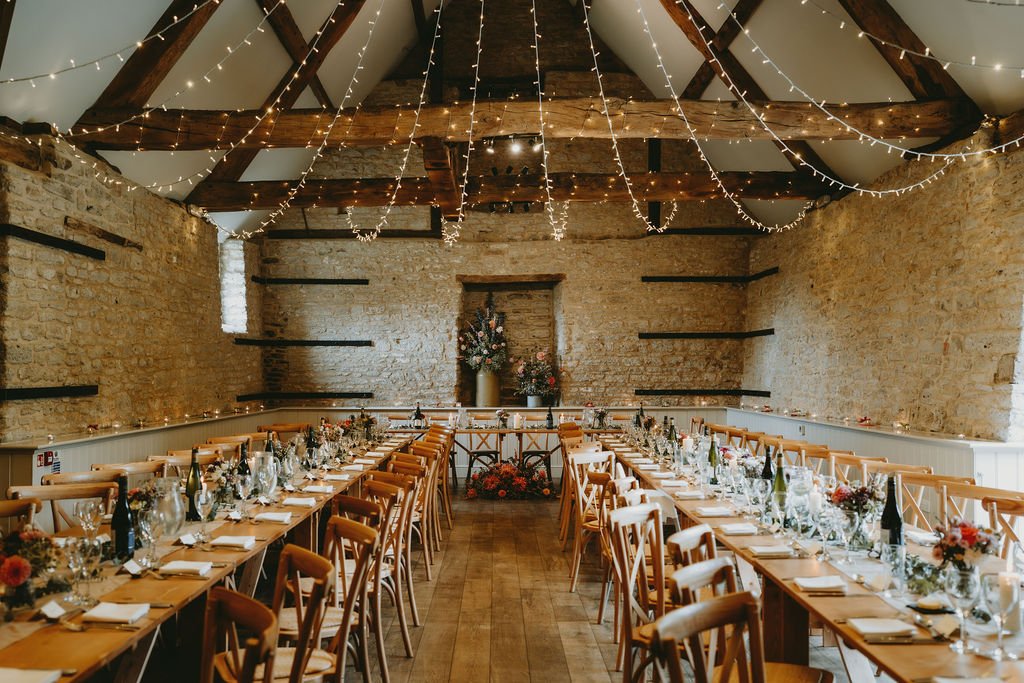 Charlotte &amp; James chose rustic long tables for their September wedding, and they suited the barn perfectly 🤍

Running the length of the room beneath the beams, our rustic tables created a relaxed, sociable feel from the moment guests sat down. 
