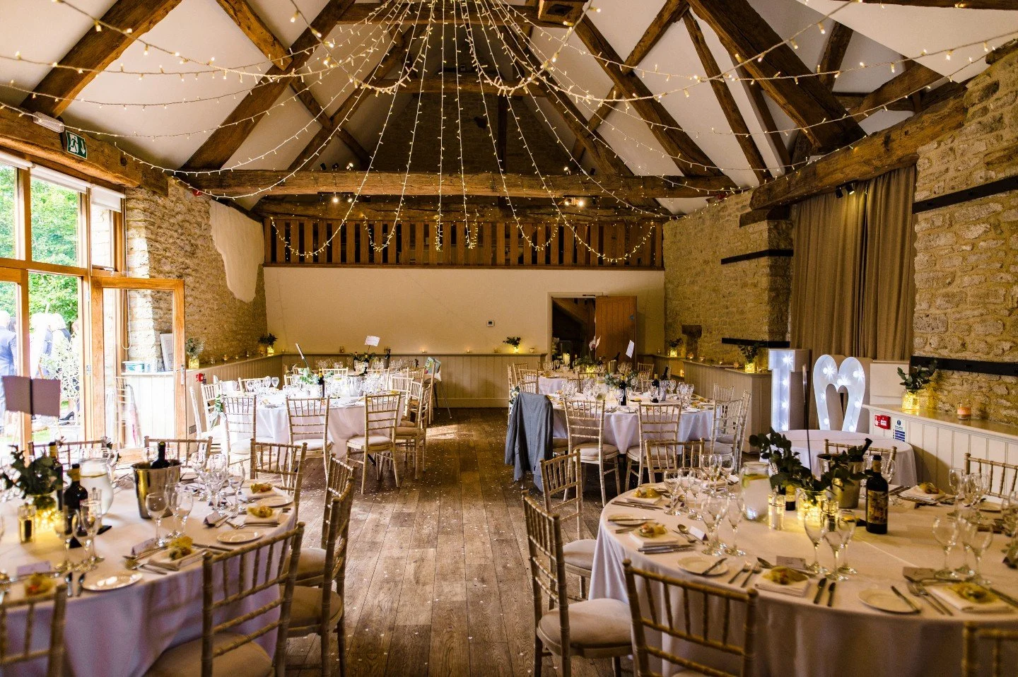 At Wick Farm, we believe your wedding should feel like you.

Whatever vision you have, we are dedicated to making it happen! 💛

From spacious round tables throughout the barn, to candles, florals or something a little bit different, the barns are a 