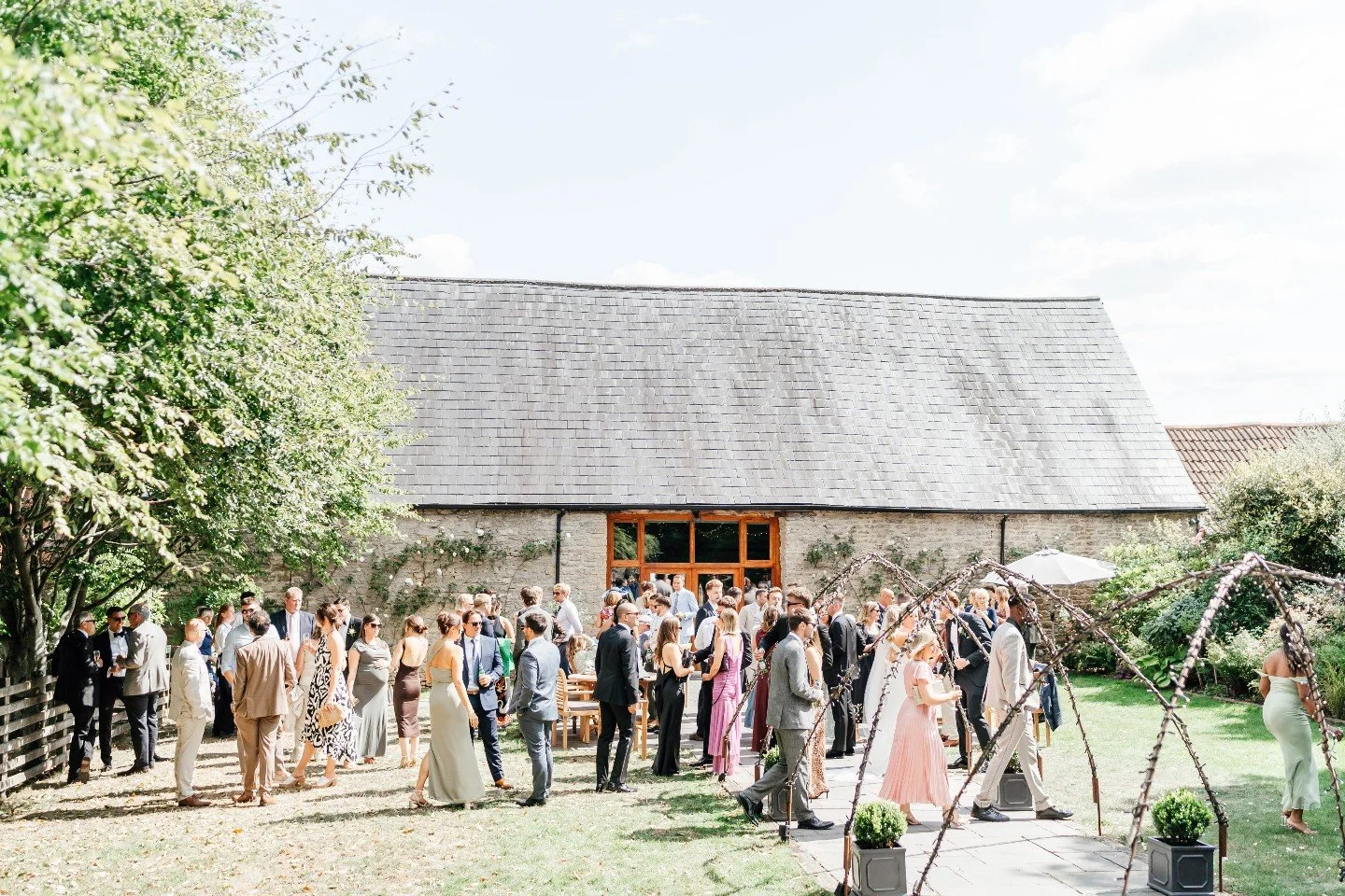 Our favourite way to celebrate 🥂

An alfresco drink and canap&eacute; reception just outside the barns ✨

As the ceremony ends and guests gather on the terrace and lawns, the atmosphere shifts. Glasses are raised, conversations spark up again, and e