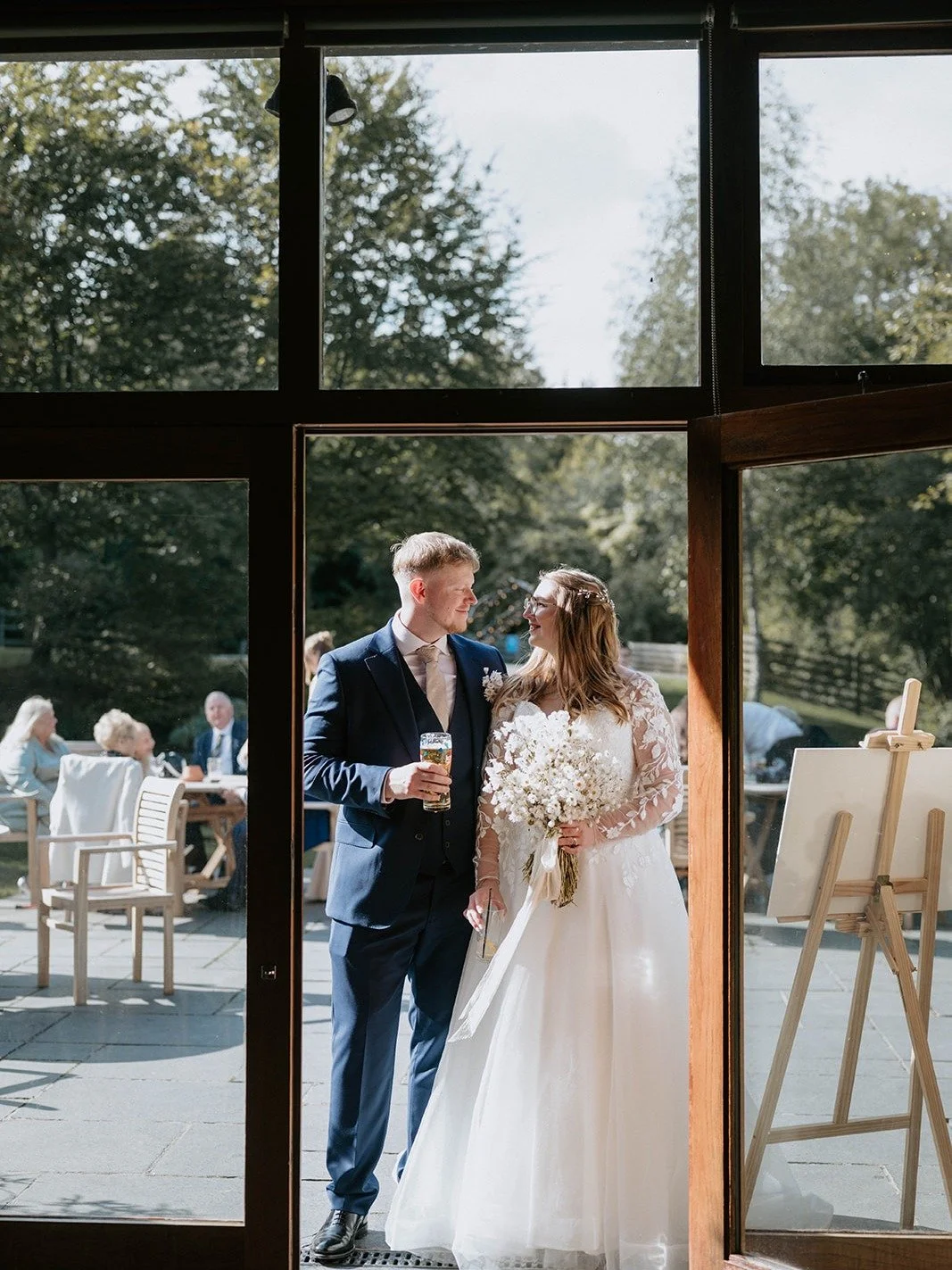 Golden hour drinks on the terrace, sun still warm, everyone relaxed&hellip; 🥂

Then the doors open, and it all flows inside into the Upper Barn, softly lit, tables set, everything ready for the next part of the celebration.

No big pause, no awkward
