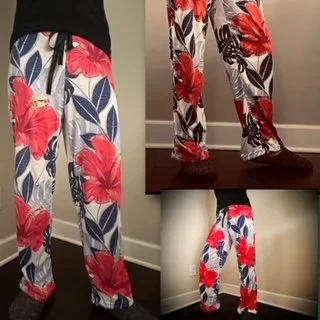 Woman wearing floral pajama bottoms