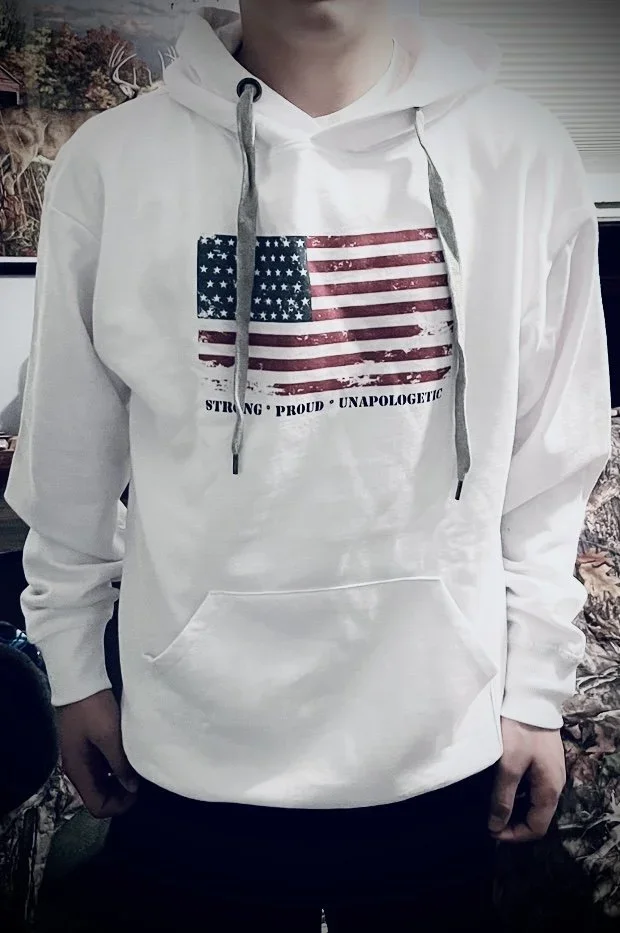 Boy wearing a patriotic American Flag white hoodie sweatshirt