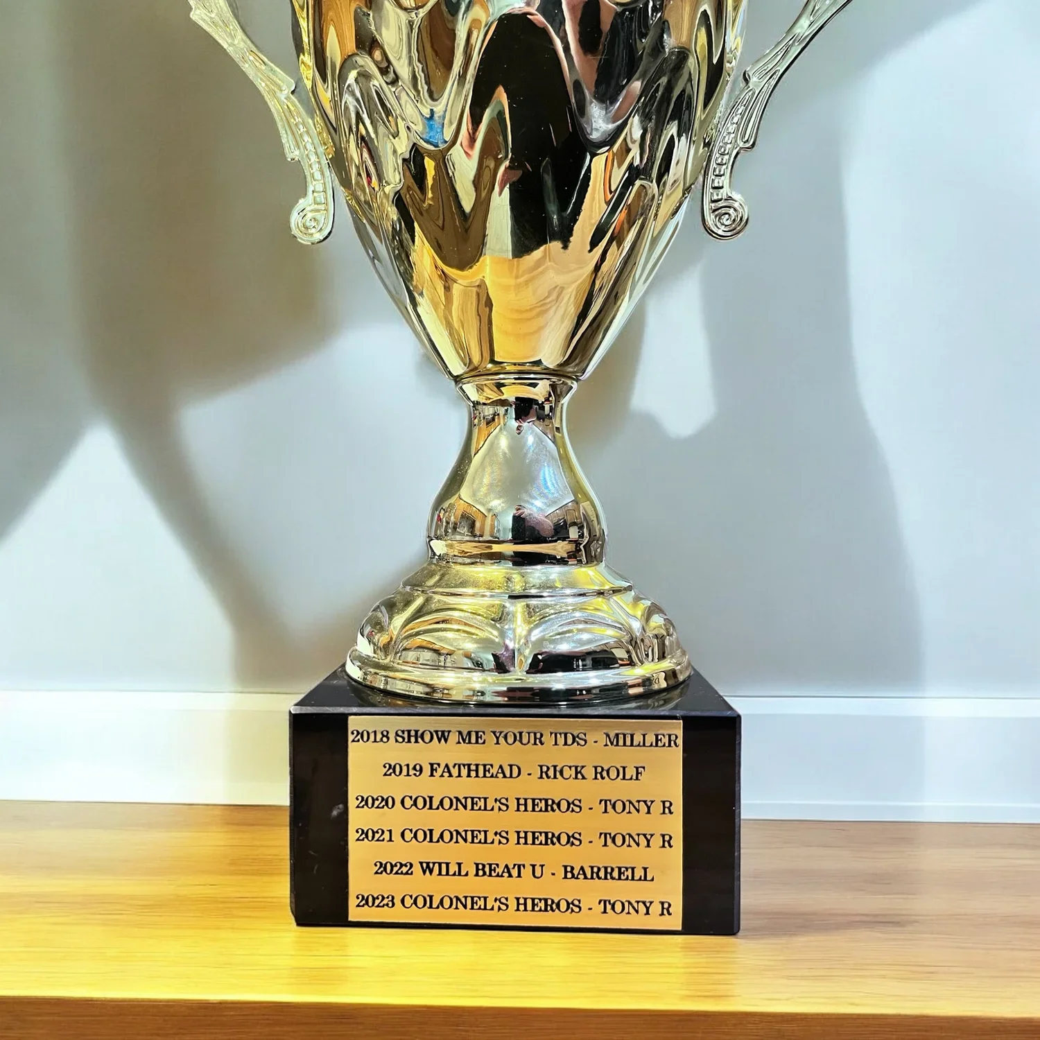 Image of a trophy with an engraved plaque