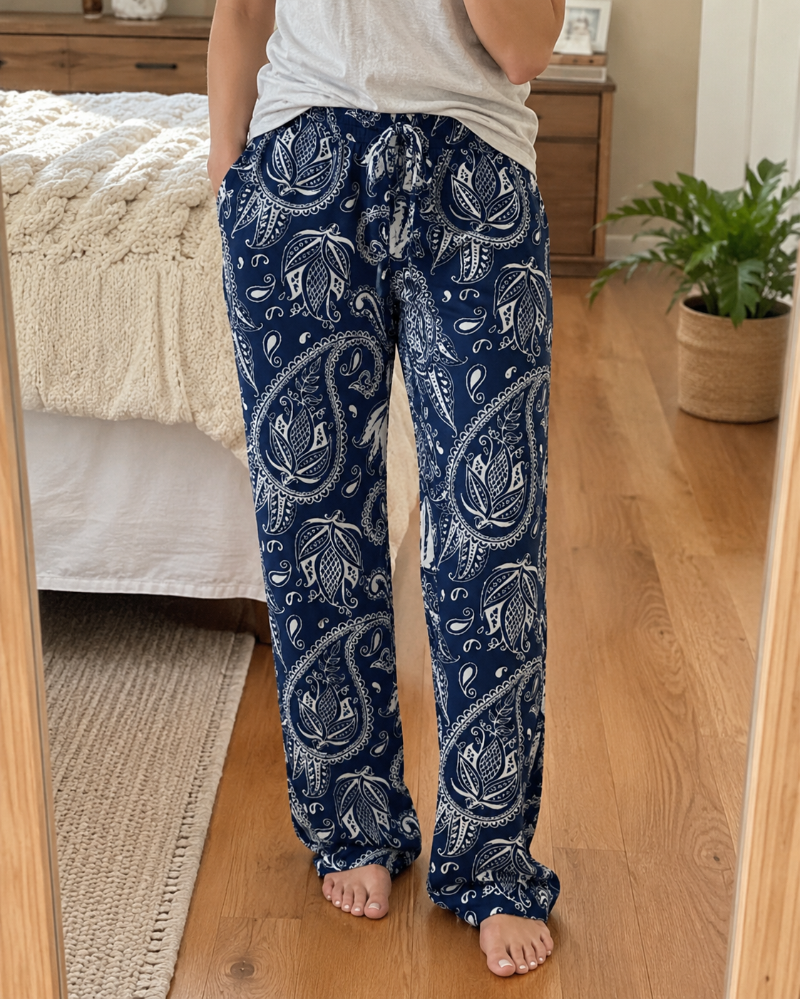 Woman wearing pajama bottoms