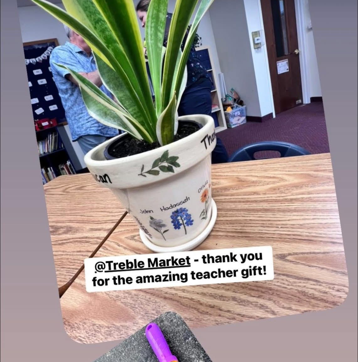 Image of a resin coated personalized clay flower pot and saucer