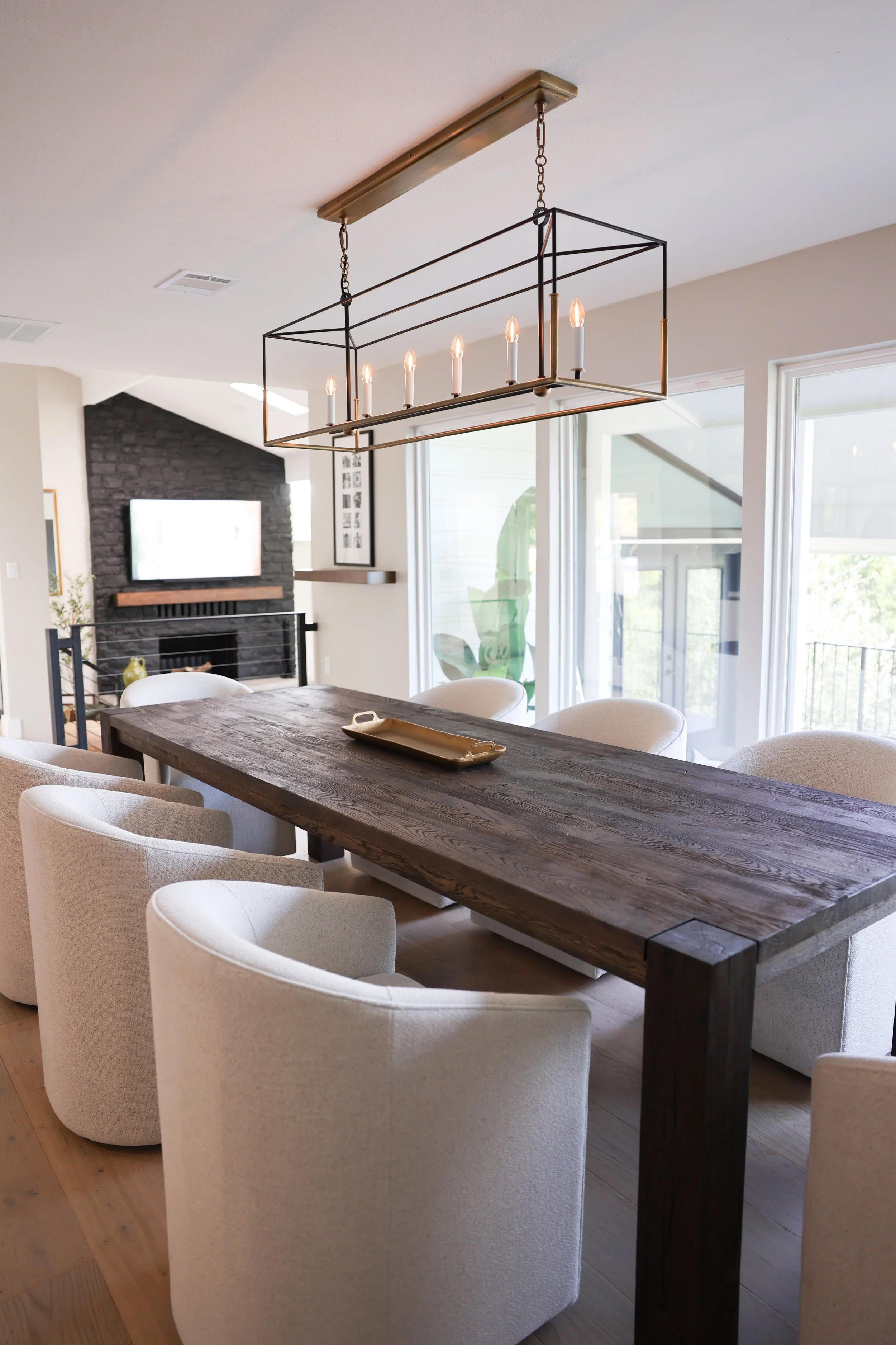 Kitchen dining area with expansive dining table and beautiful chairs 