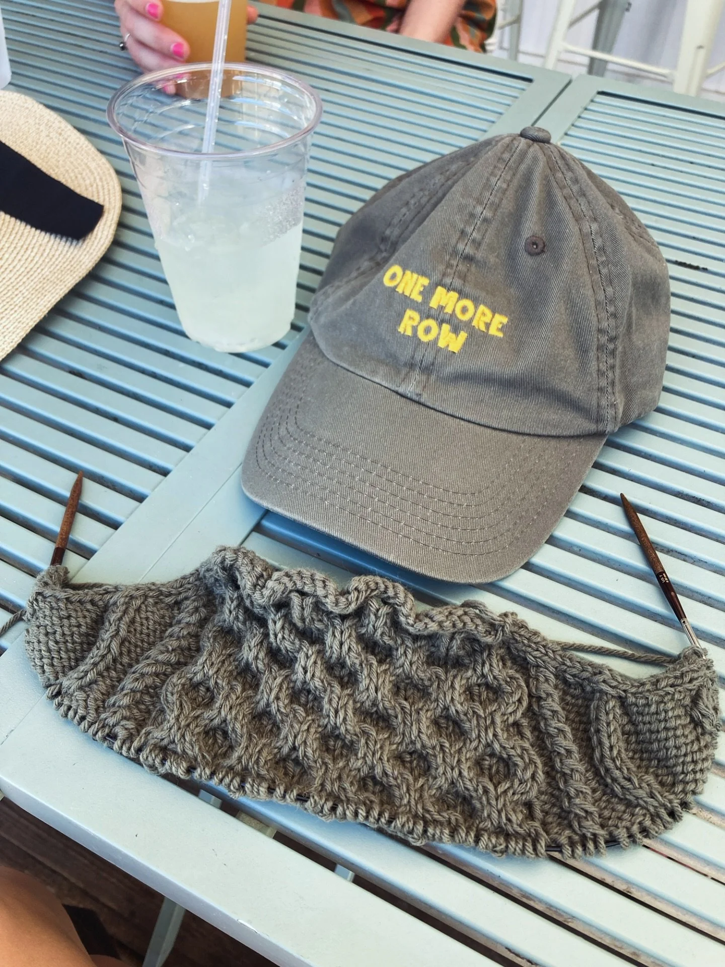 My unofficial Summer of Cables continues with this #dagmarzippersweater in @knittingforolive heavy merino which happens to coordinate perfectly with my @degen.us hat &amp; all the many lemonades I&rsquo;ve been drinking. Digging all the cool greens! 