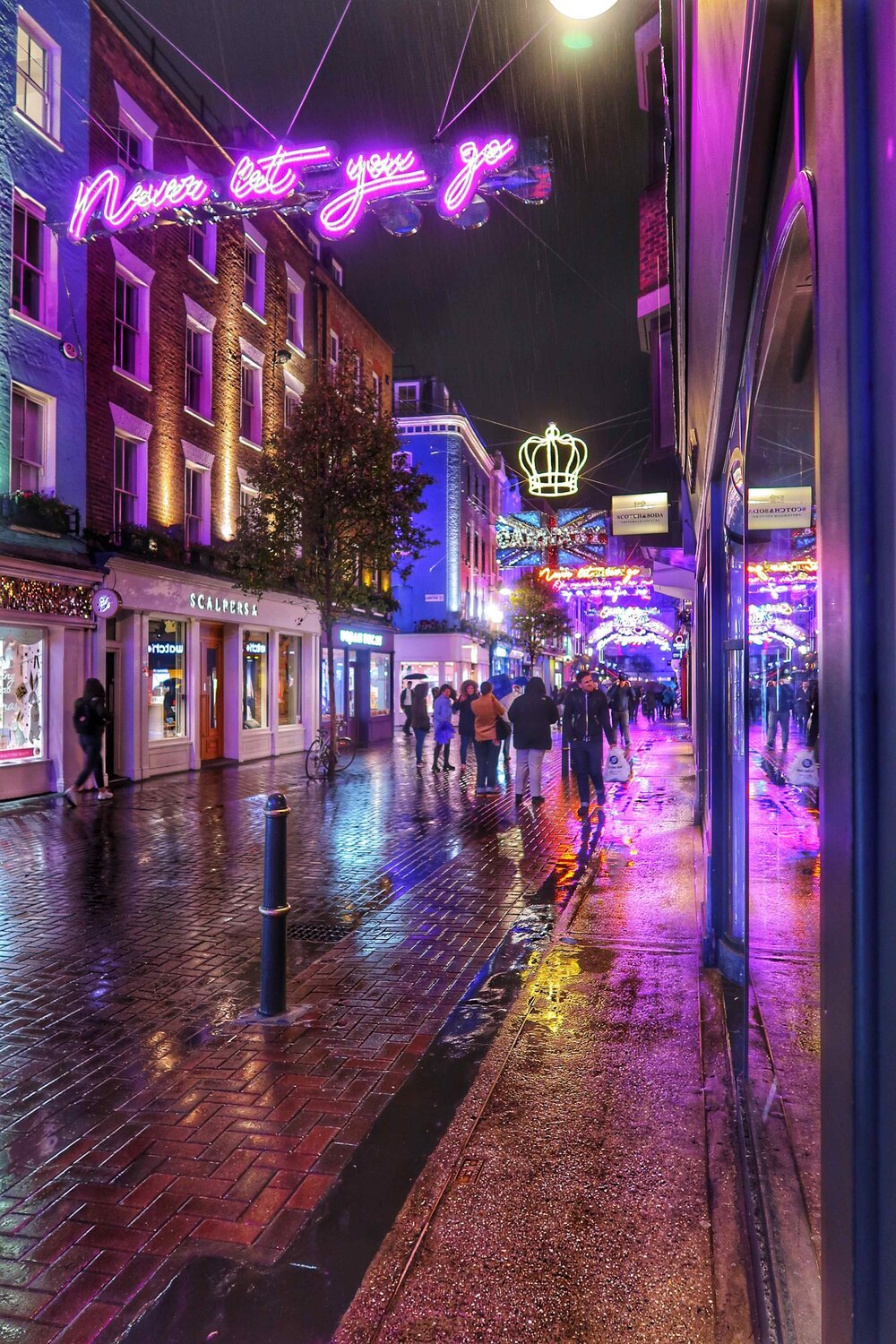 Lit up at night, Carnaby is a beautiful spot in London, England.