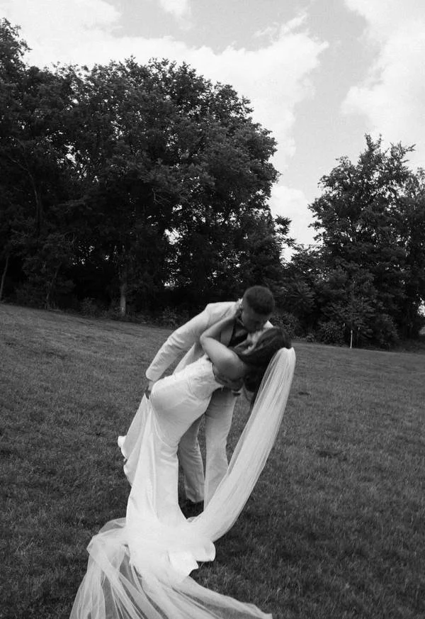 A couple shares a heartfelt embrace at a Des Moines event venue, captured in a beautiful photo that reflects love, connection, and timeless celebration.