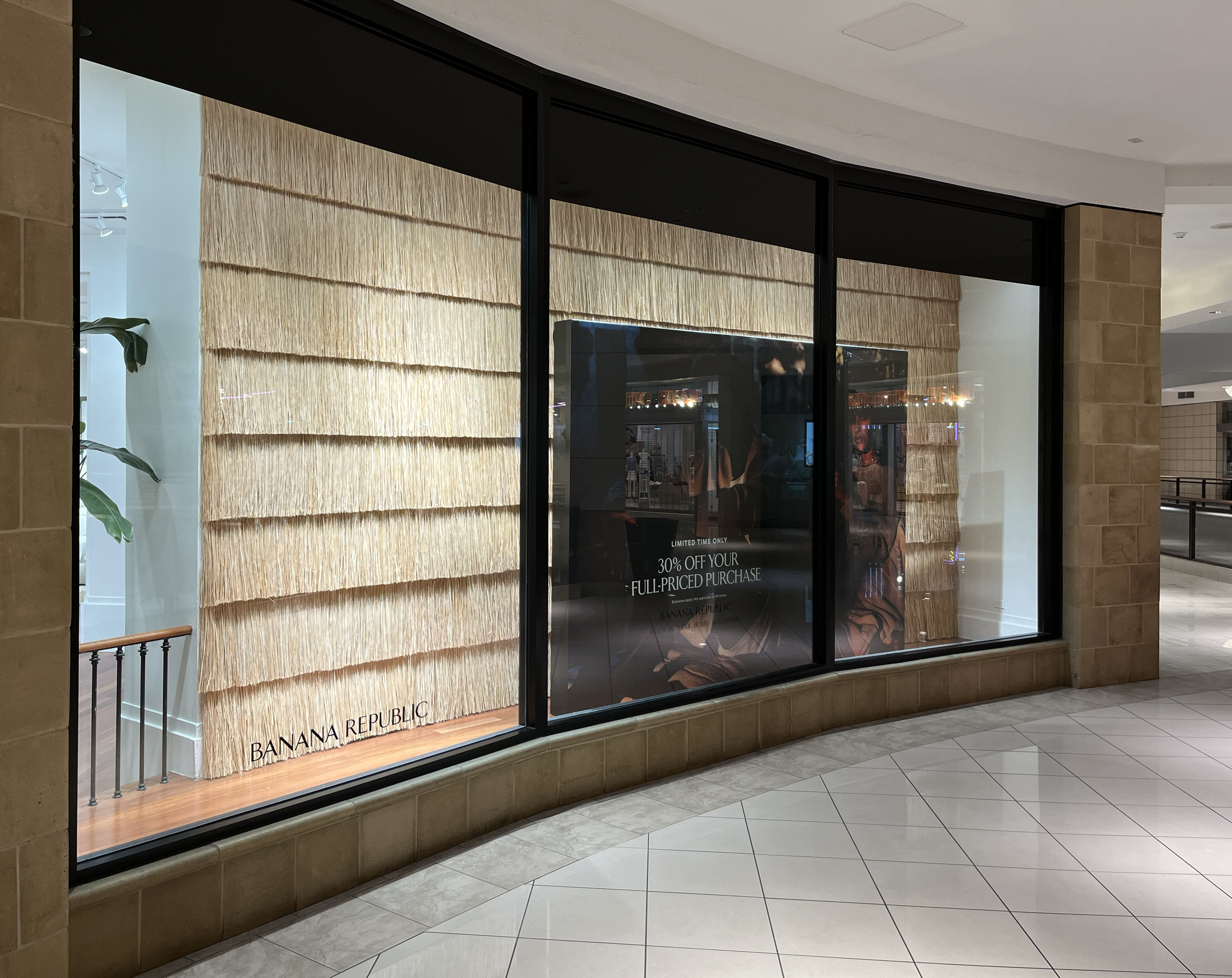 Raffia wall window display.png