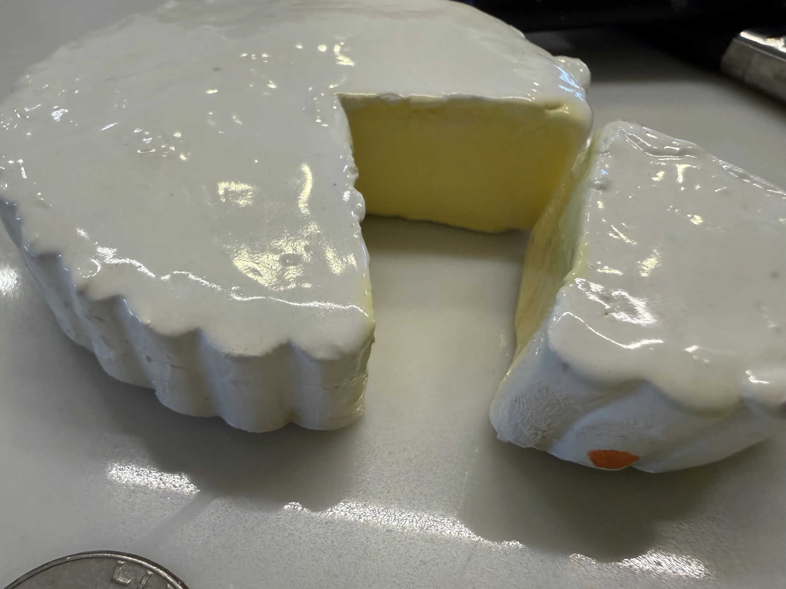 Brie cheese paper weights