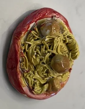 Spaghetti paper weights