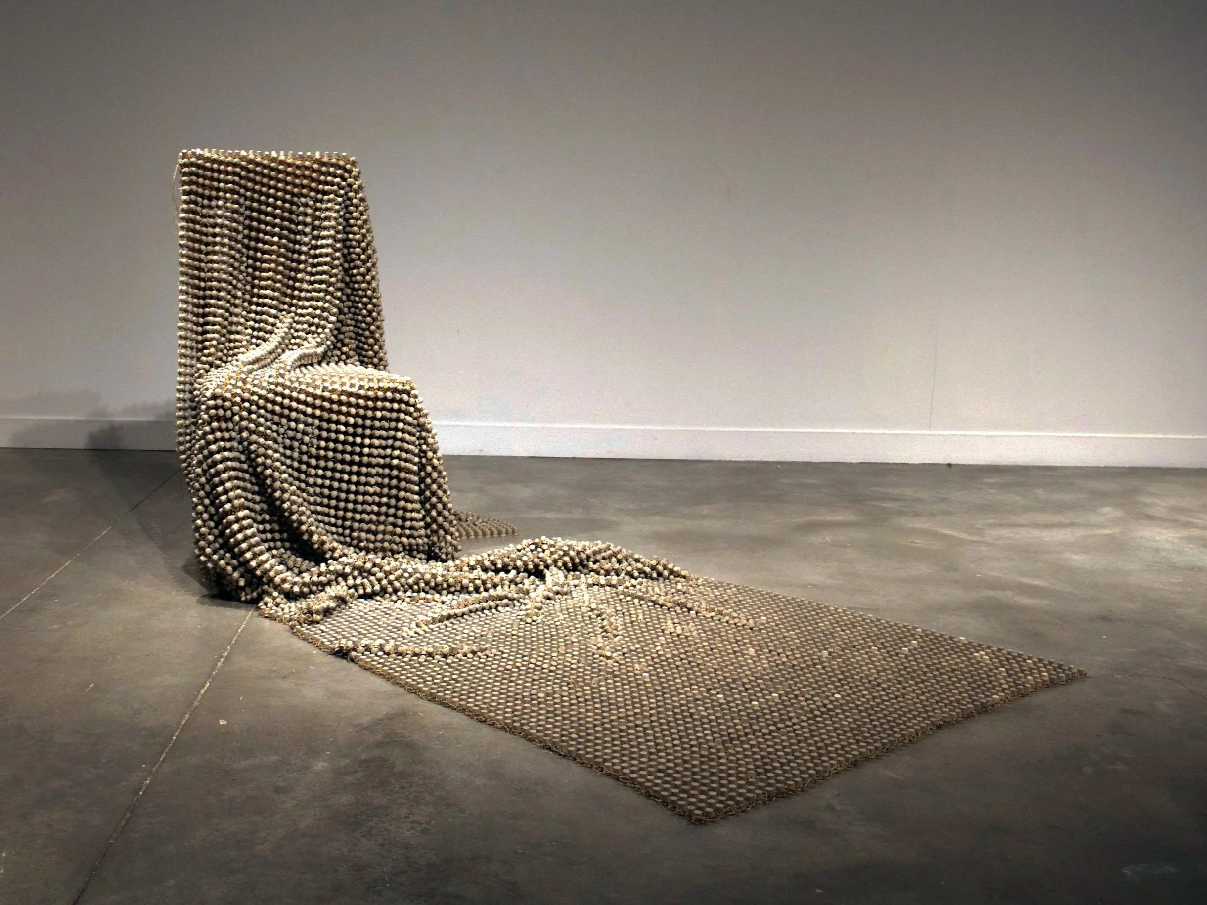 10,962 / Porcelain, waxed thread, chair.