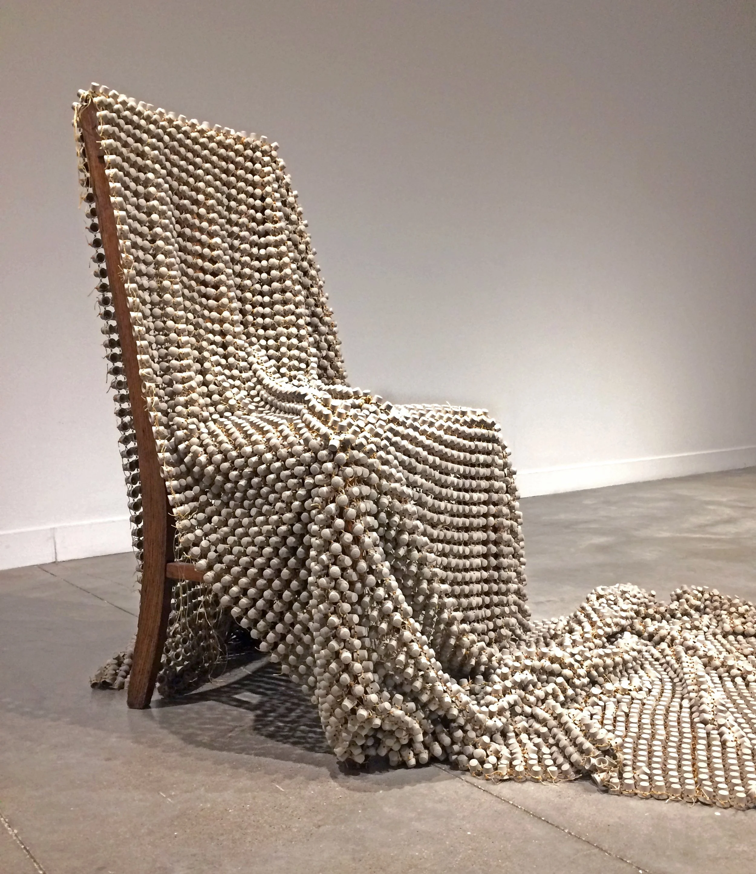 10,962, detail, 2017. Porcelain, waxed thread. Allison Gailey, formerly Allison Craver. Installation view, Safe | Passage, Urban Art Space, Columbus, OH.