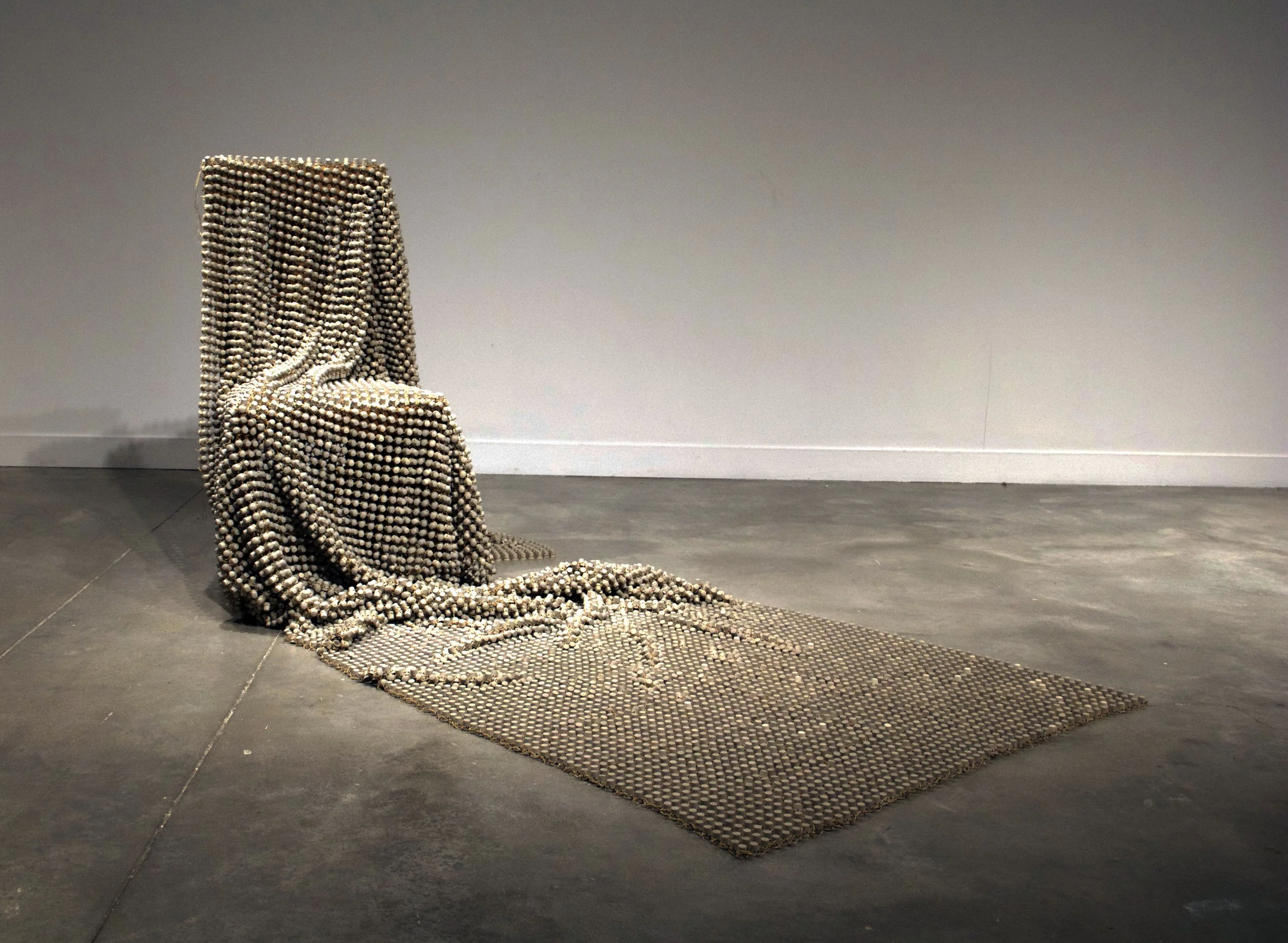 10,962, 2017. Porcelain, waxed thread. Allison Gailey, formerly Allison Craver. Installation view, Safe | Passage, Urban Art Space, Columbus, OH.