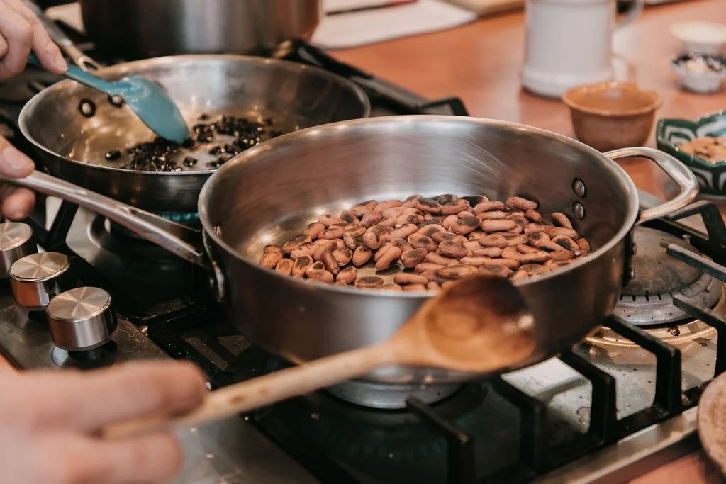 toasting cacao for mole Casa Jacaranda Boot Camp.jpg