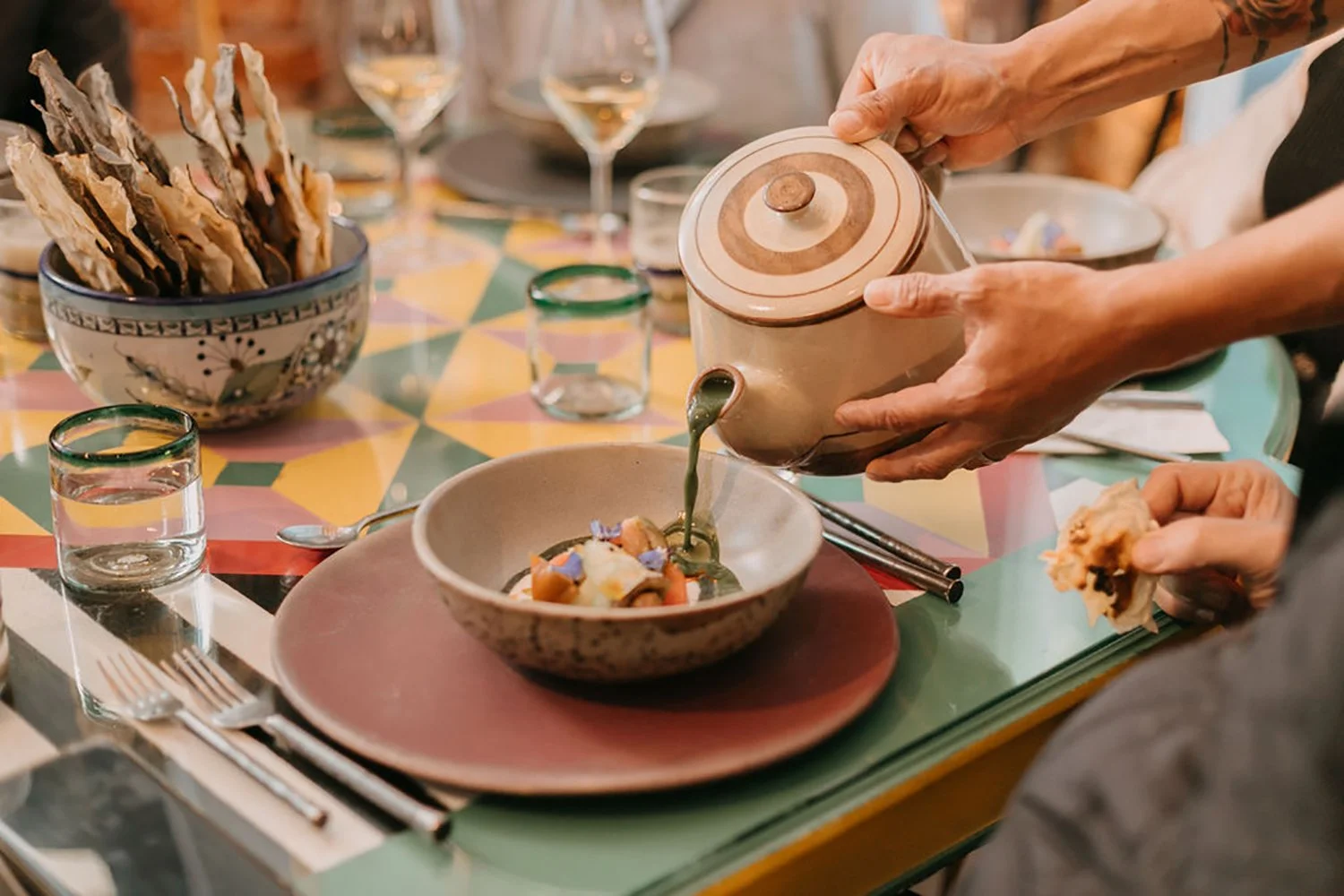 Chefs table dinner at Casa Jacaranda Mexico serving the table.jpg