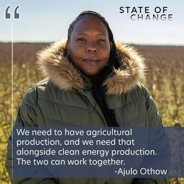 A woman standing outdoors in a field, wearing a coat with a fur-lined hood, with a clear sky above, and a quote overlay about agriculture and clean energy by Ajulo Othow.