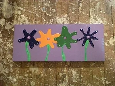 "four flowers" by Kirk Stansbury.